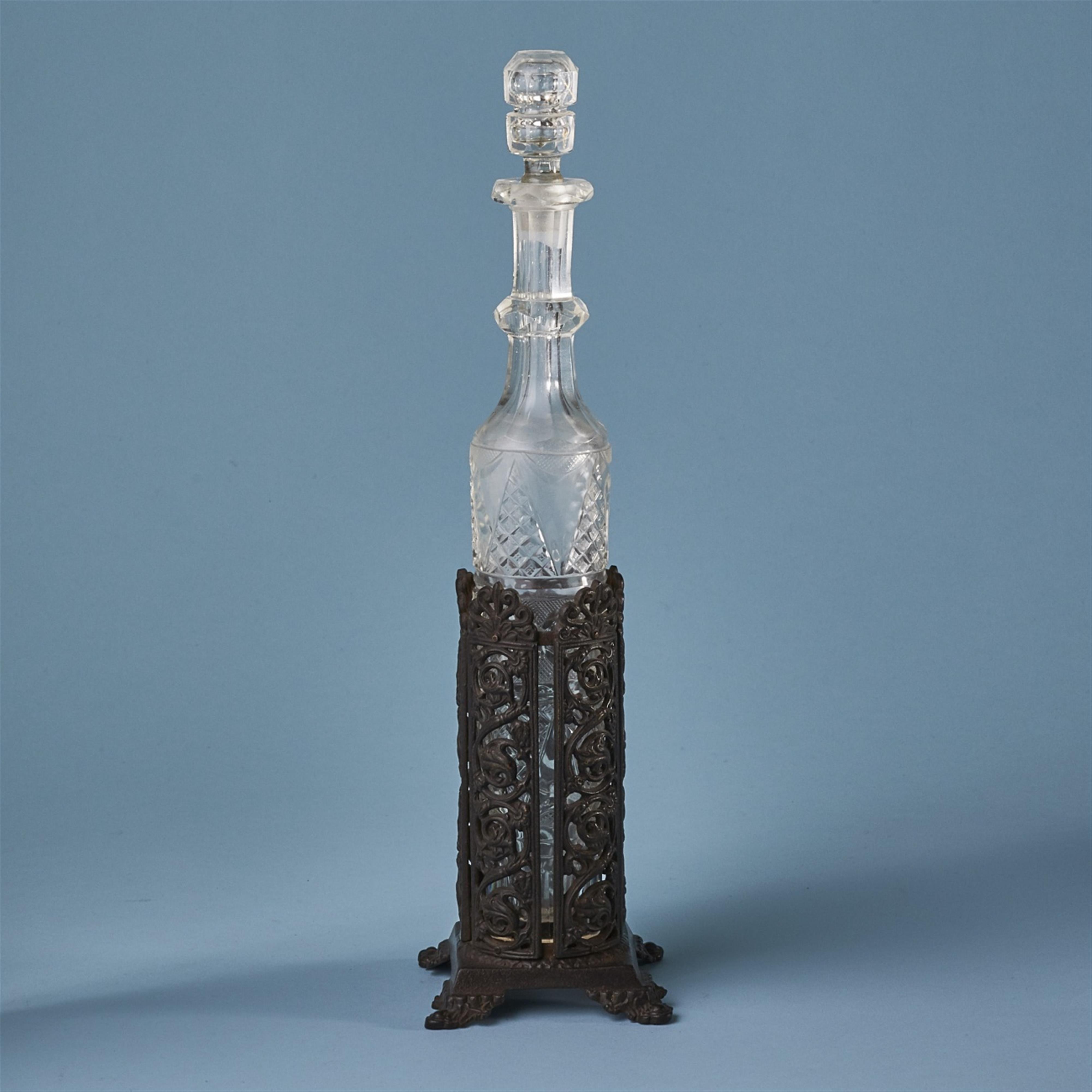 A cast iron bottle stand - image-1
