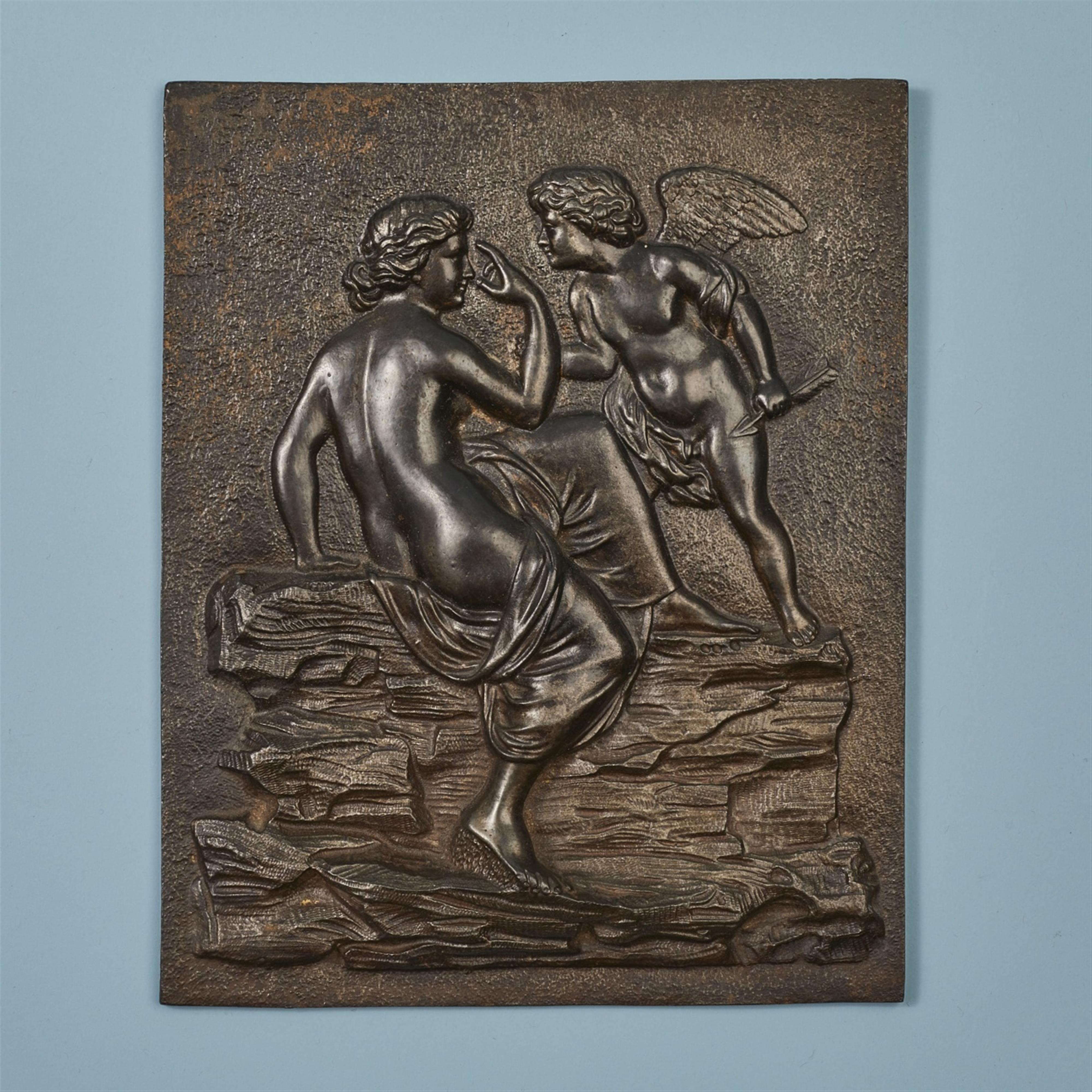 A cast iron plaque with Venus and Cupid - image-1