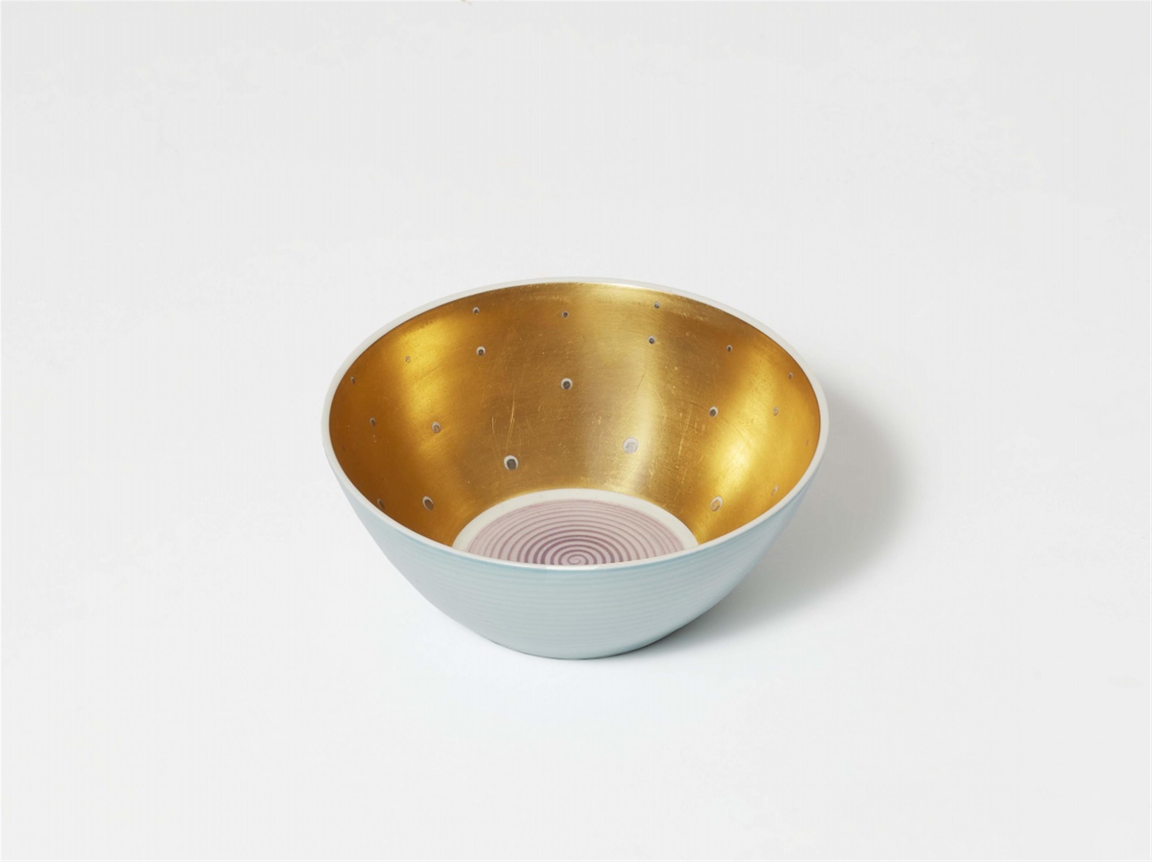 A Berlin KPM porcelain dish with a gilded interior - image-1