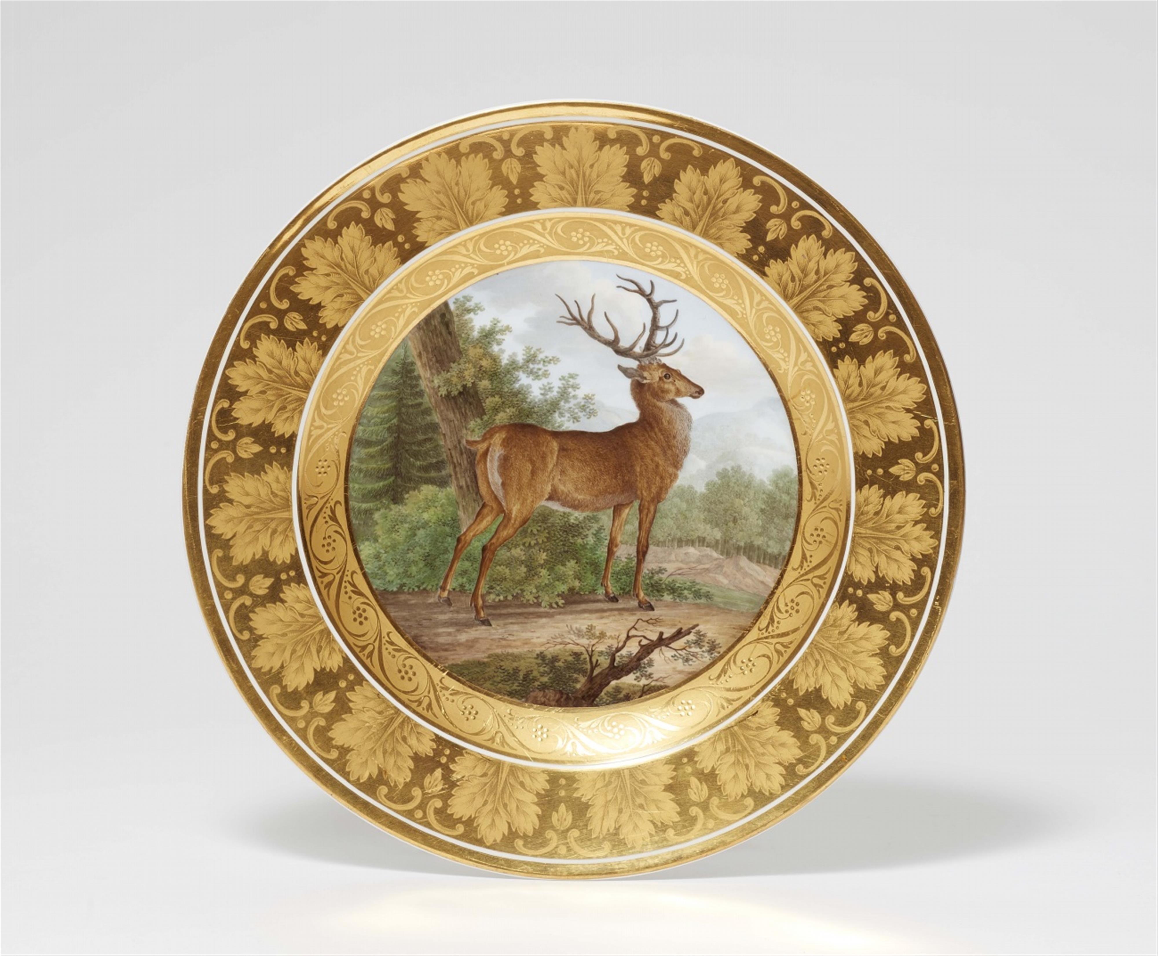 A Berlin KPM porcelain dessert plate with a stag from a service for a general - image-1