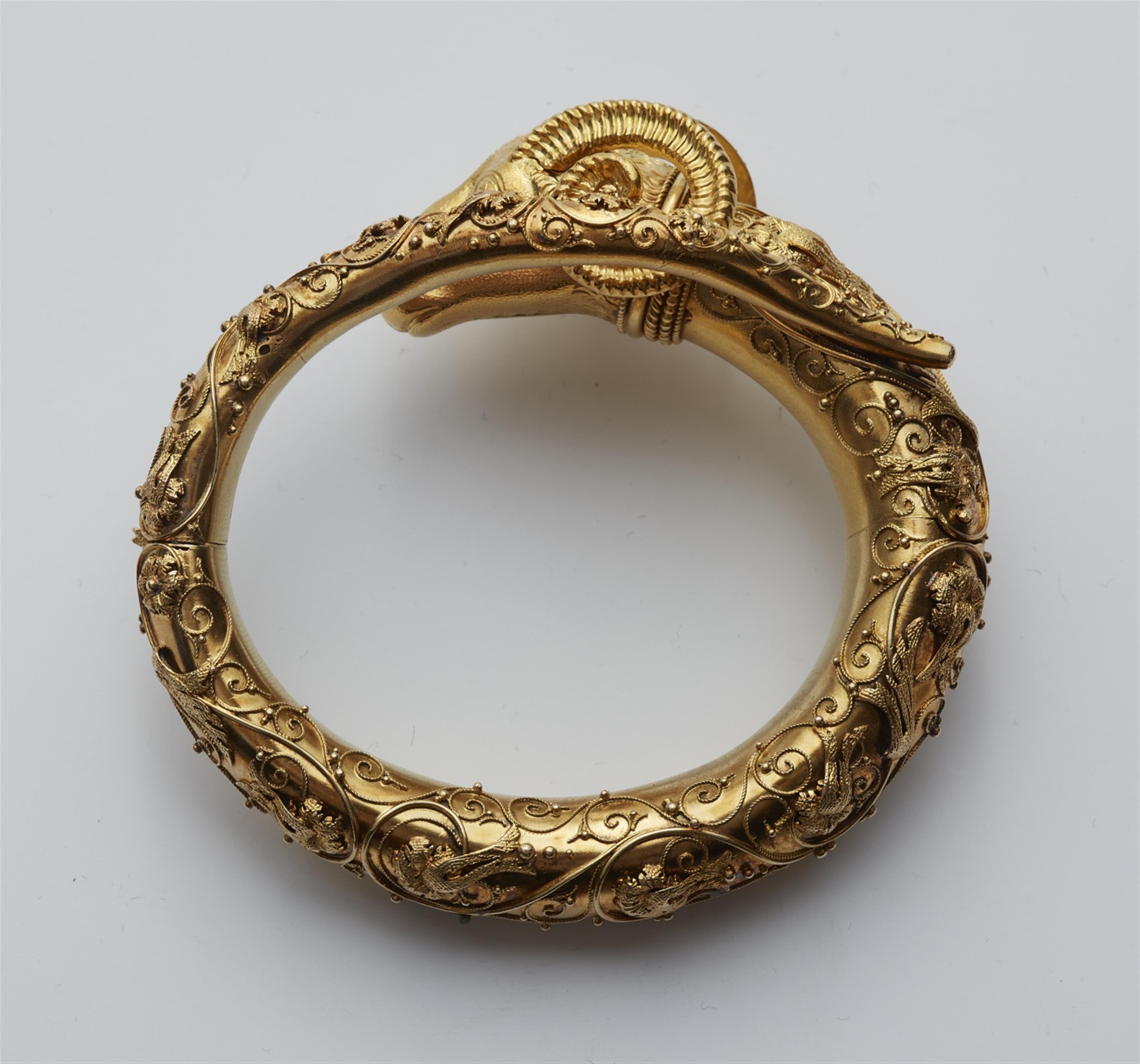 A 18k gold Etruscan style bangle - image-3