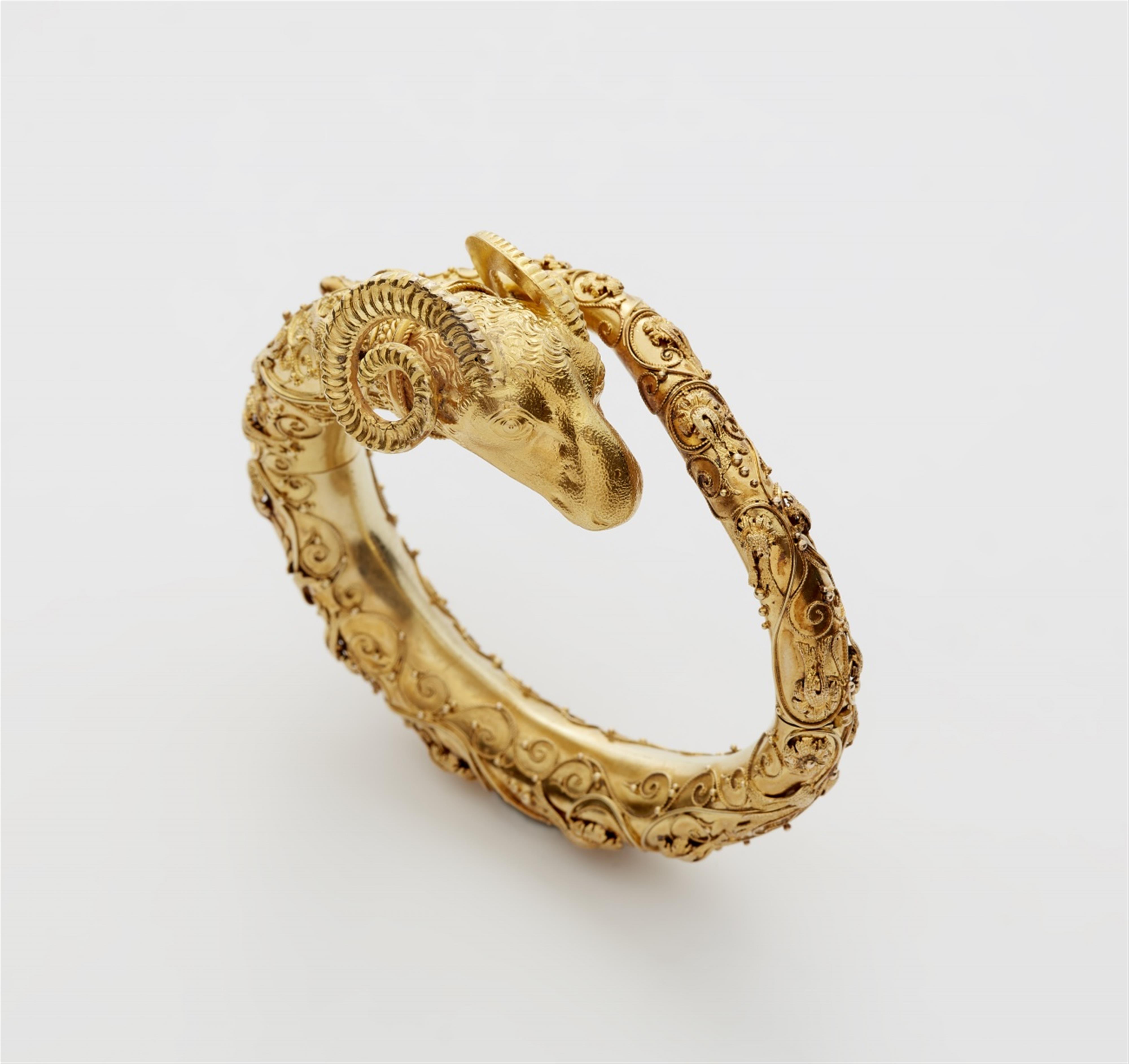 A 18k gold Etruscan style bangle - image-1