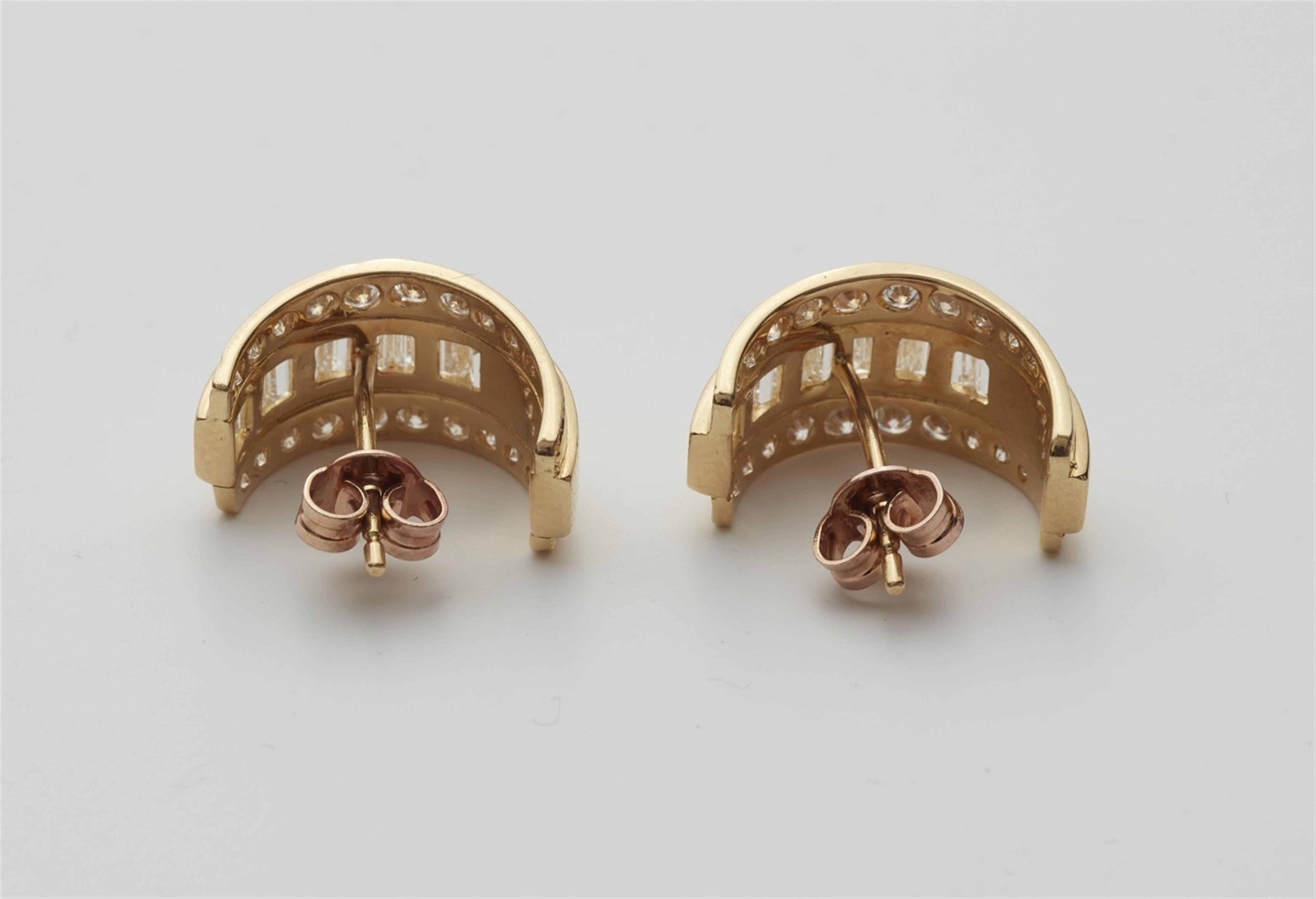 A pair of 18k gold diamond earrings - image-2