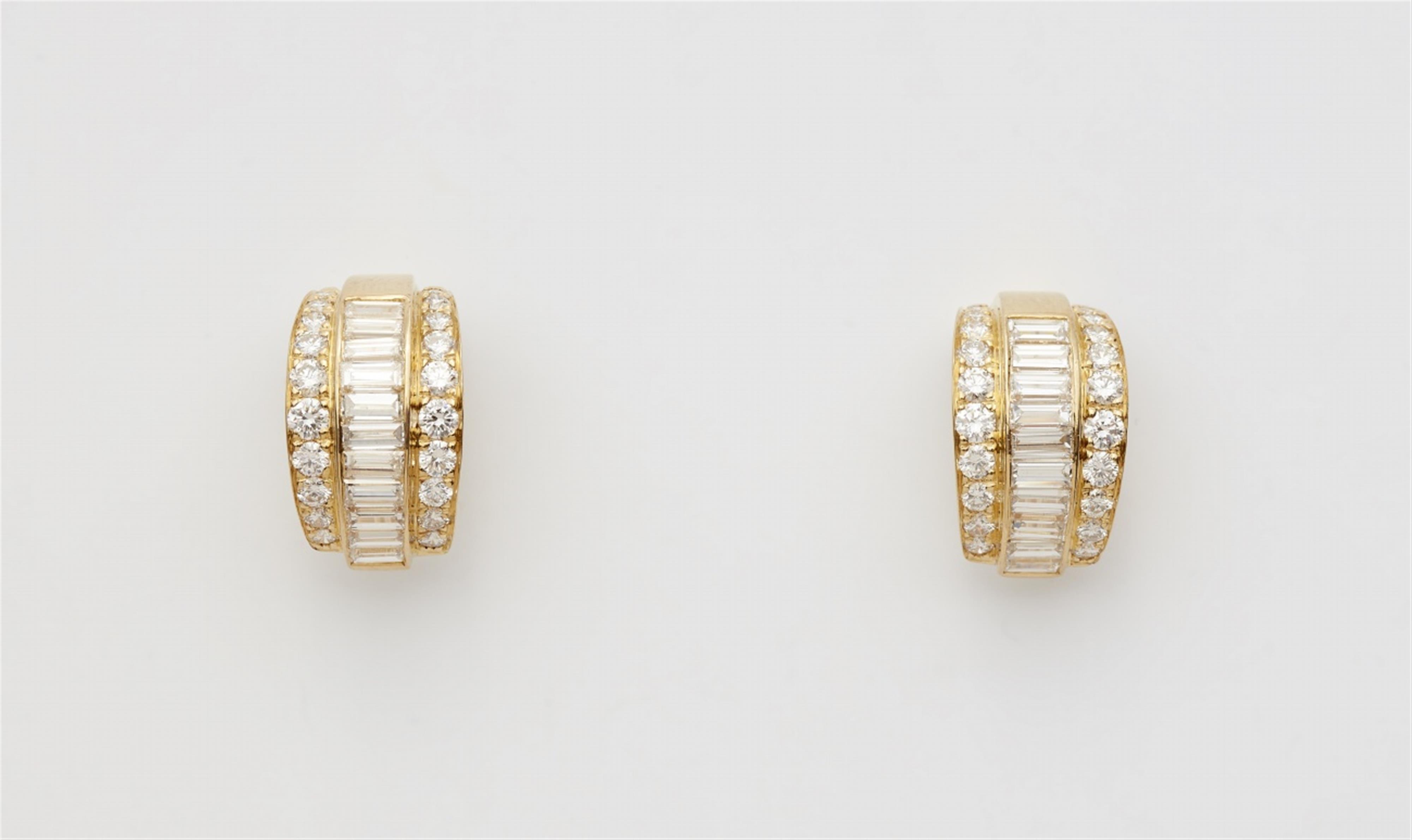 A pair of 18k gold diamond earrings - image-1