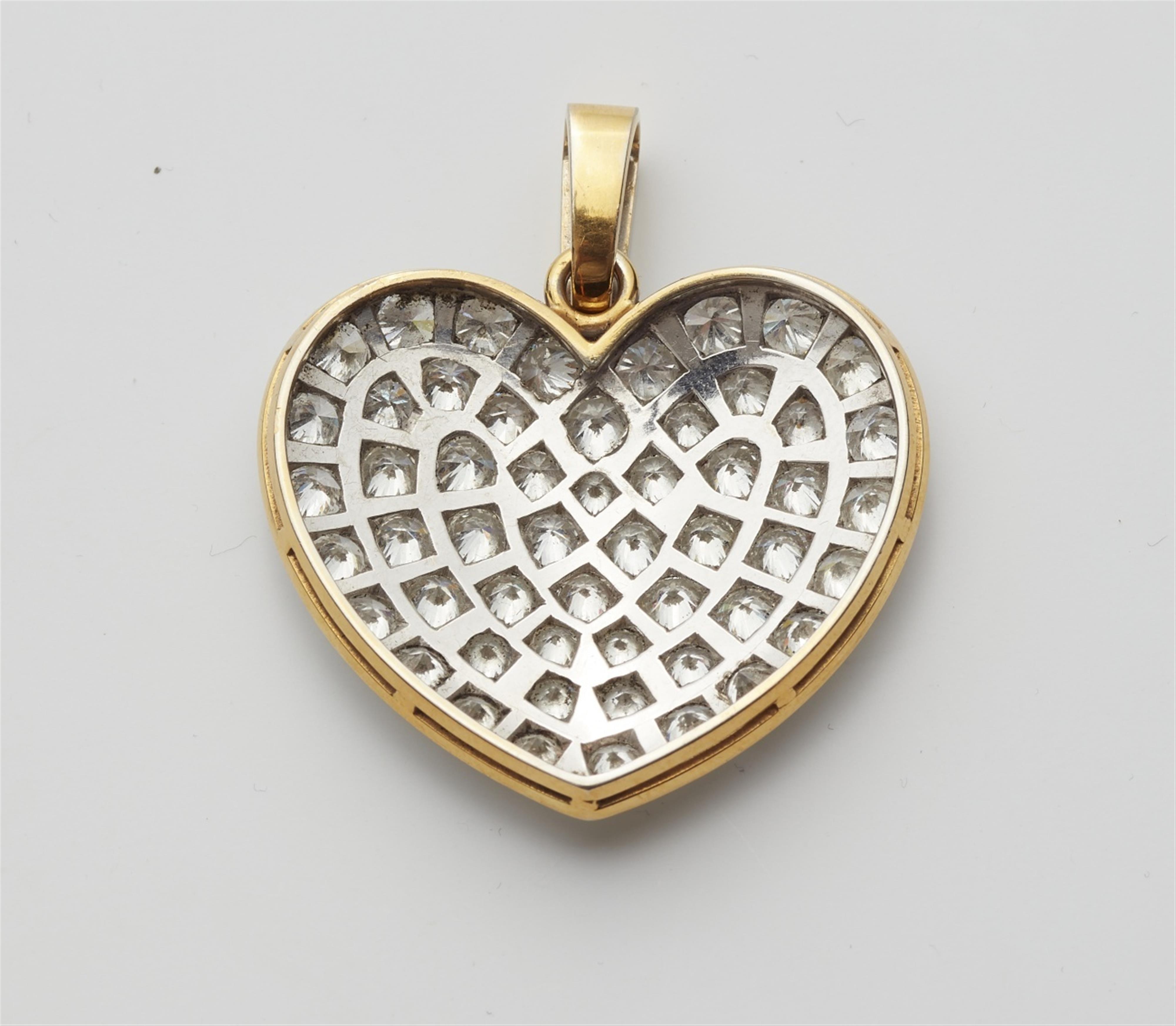 An 18k gold diamond heart pendant - image-2