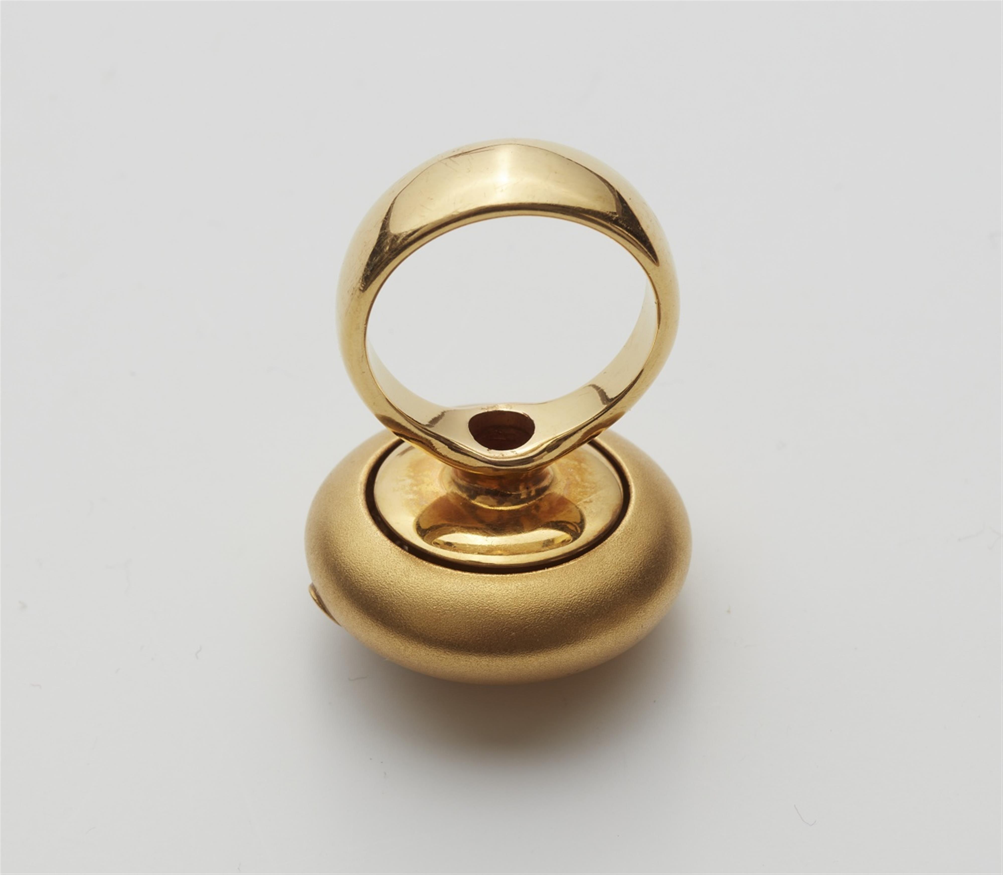 An 18k gold kinetic diamond ring - image-2