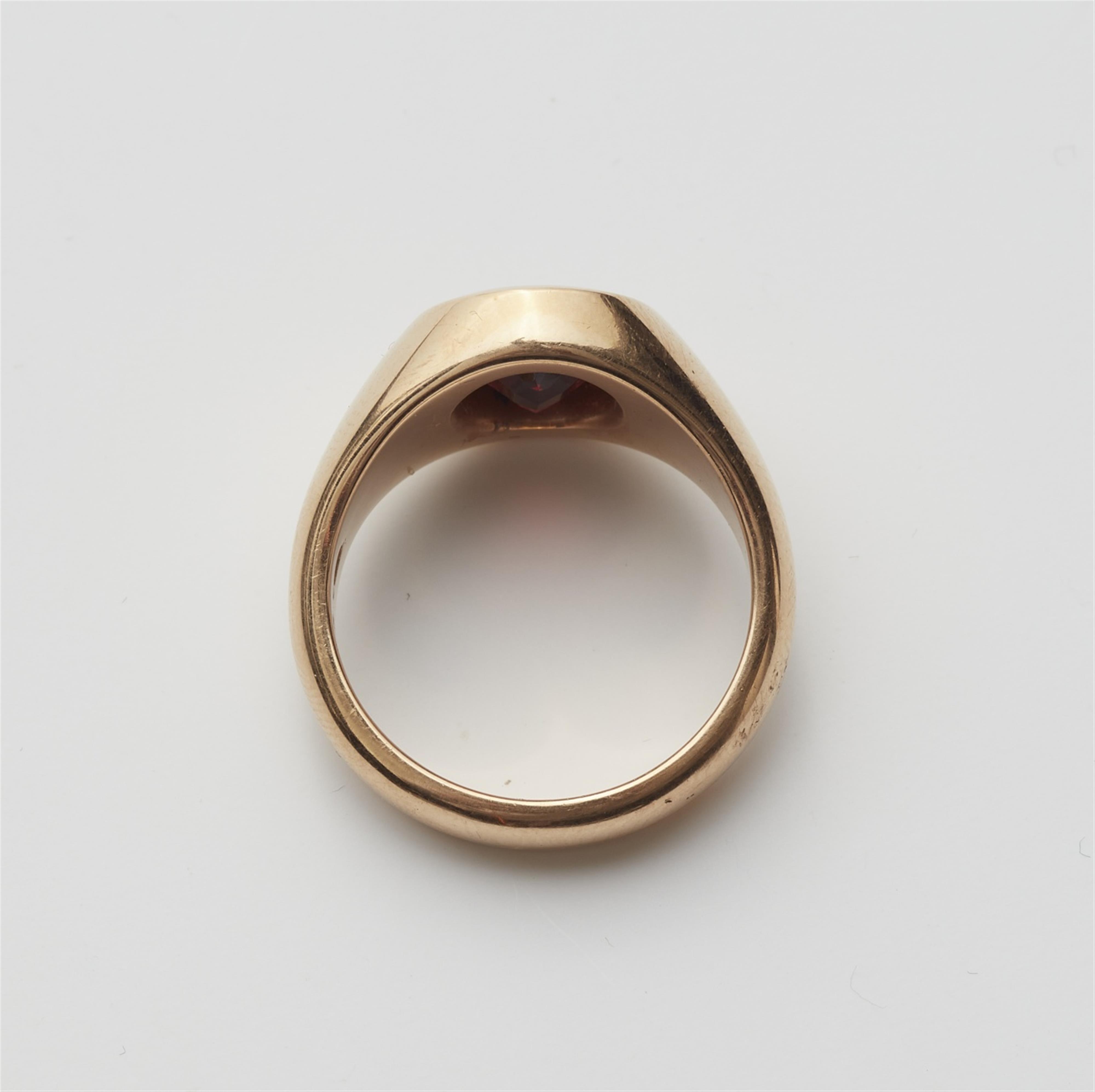 A 14k gold garnet ring - image-2