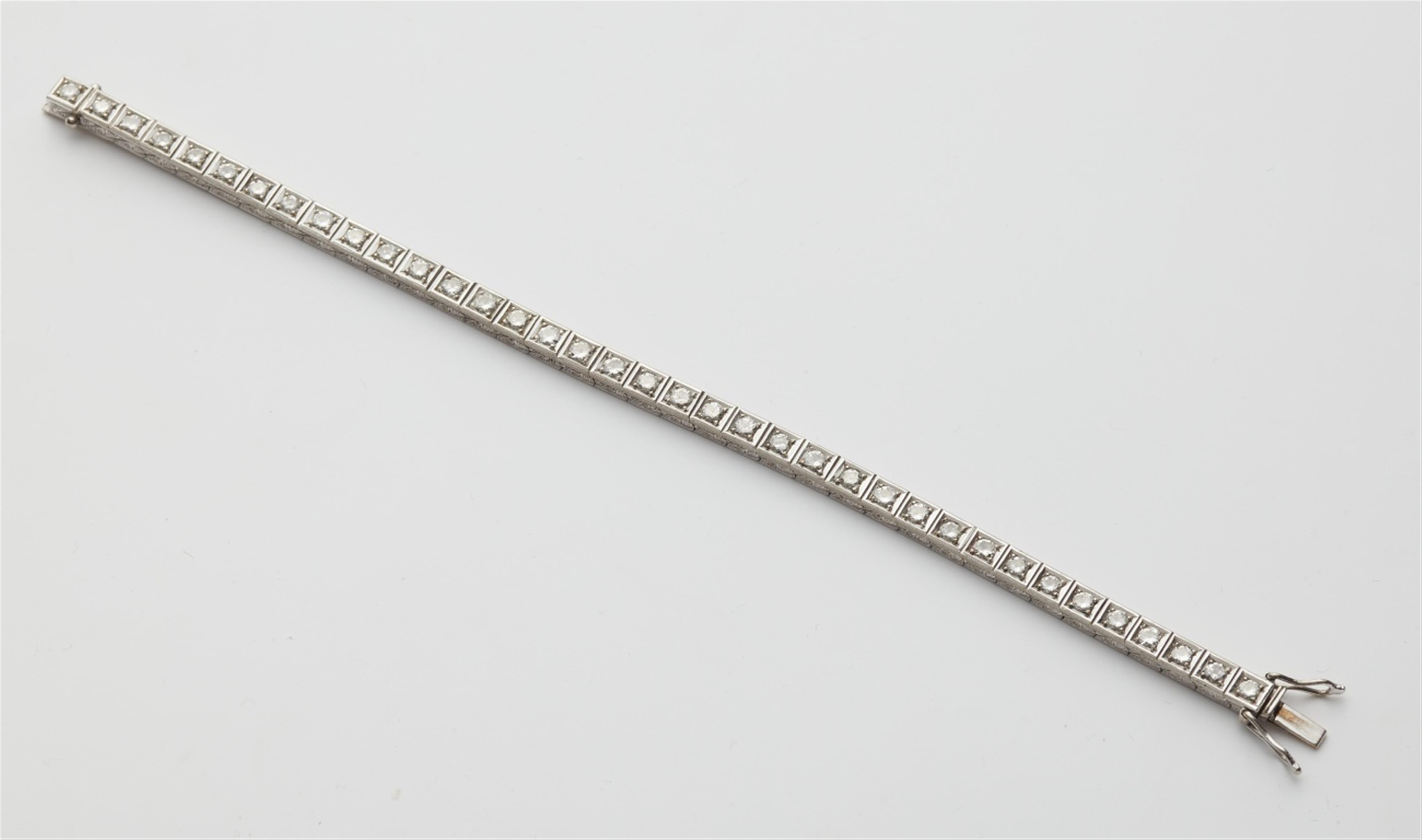 A 14k white gold diamond rivière bracelet - image-1