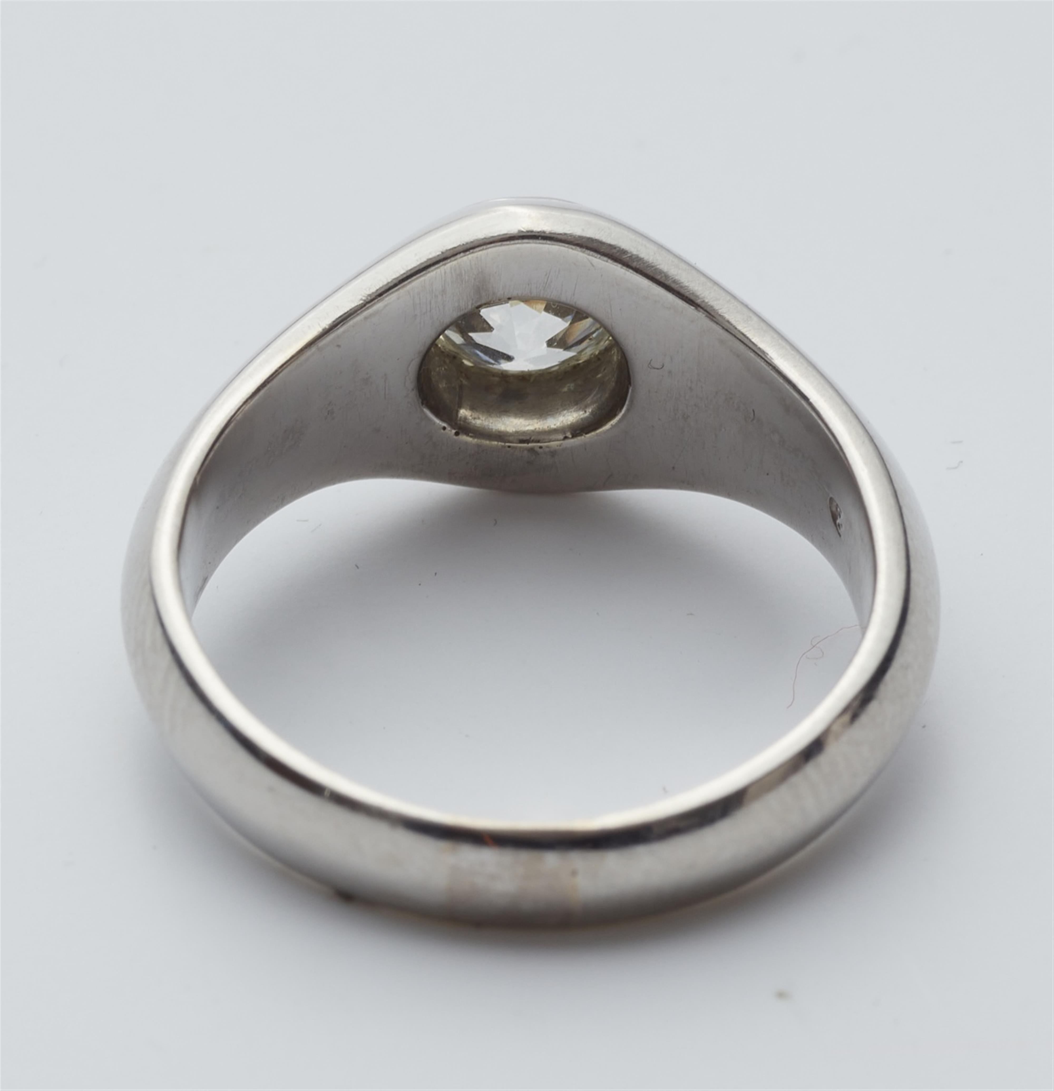 A platinum diamond solitaire ring - image-3