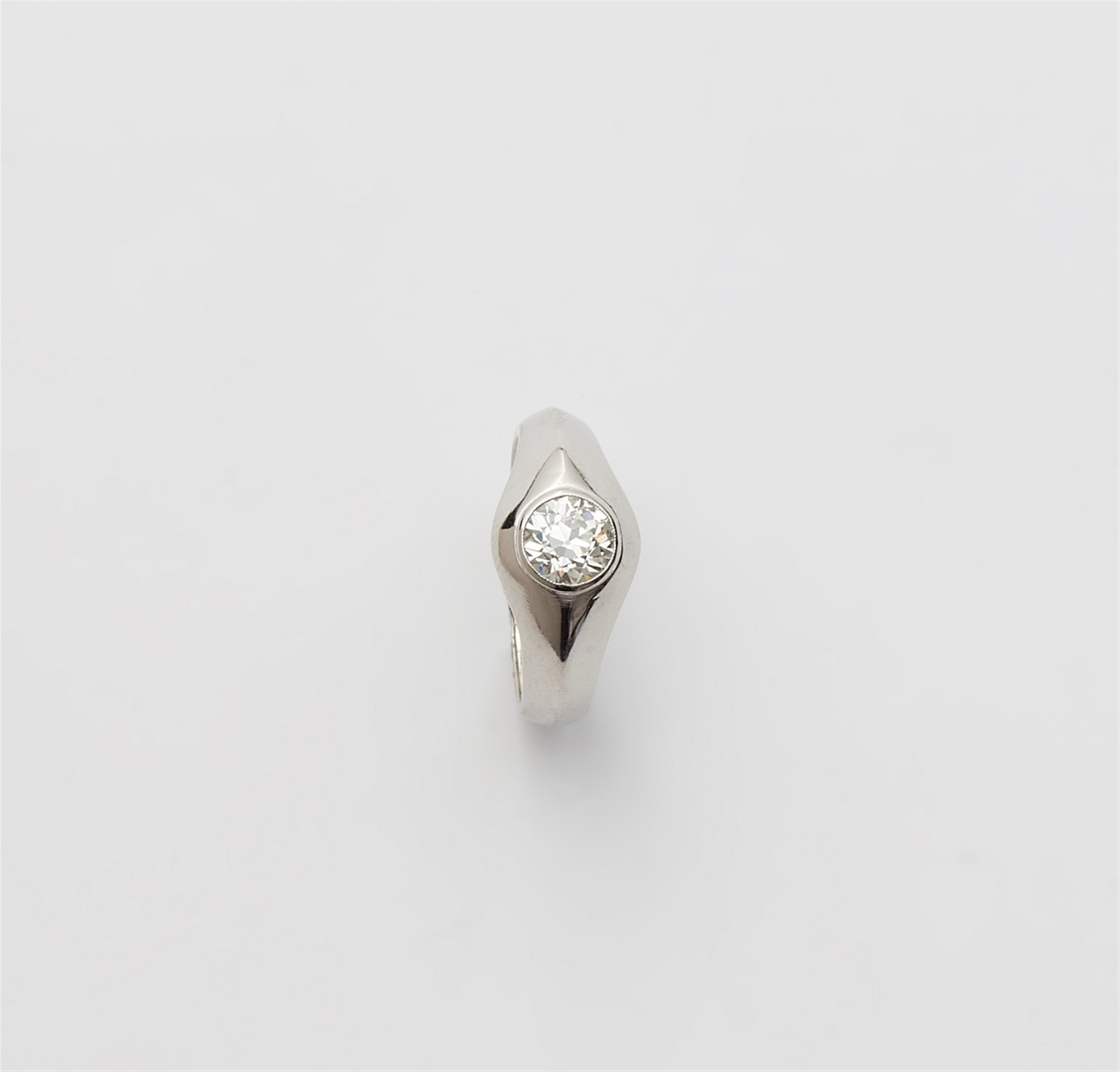A platinum diamond solitaire ring - image-1