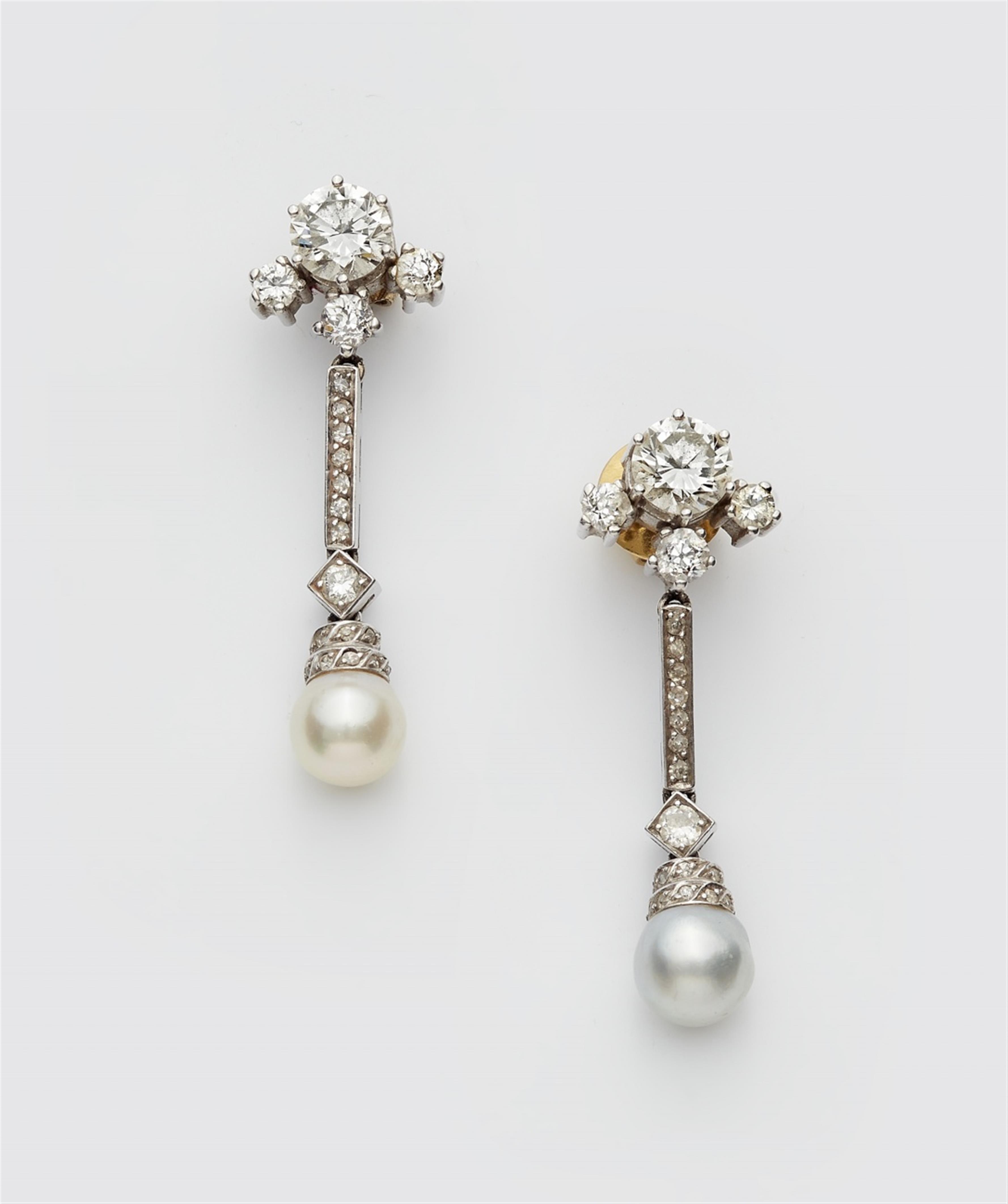 A pair of platinum diamond and pearl earrings - image-1