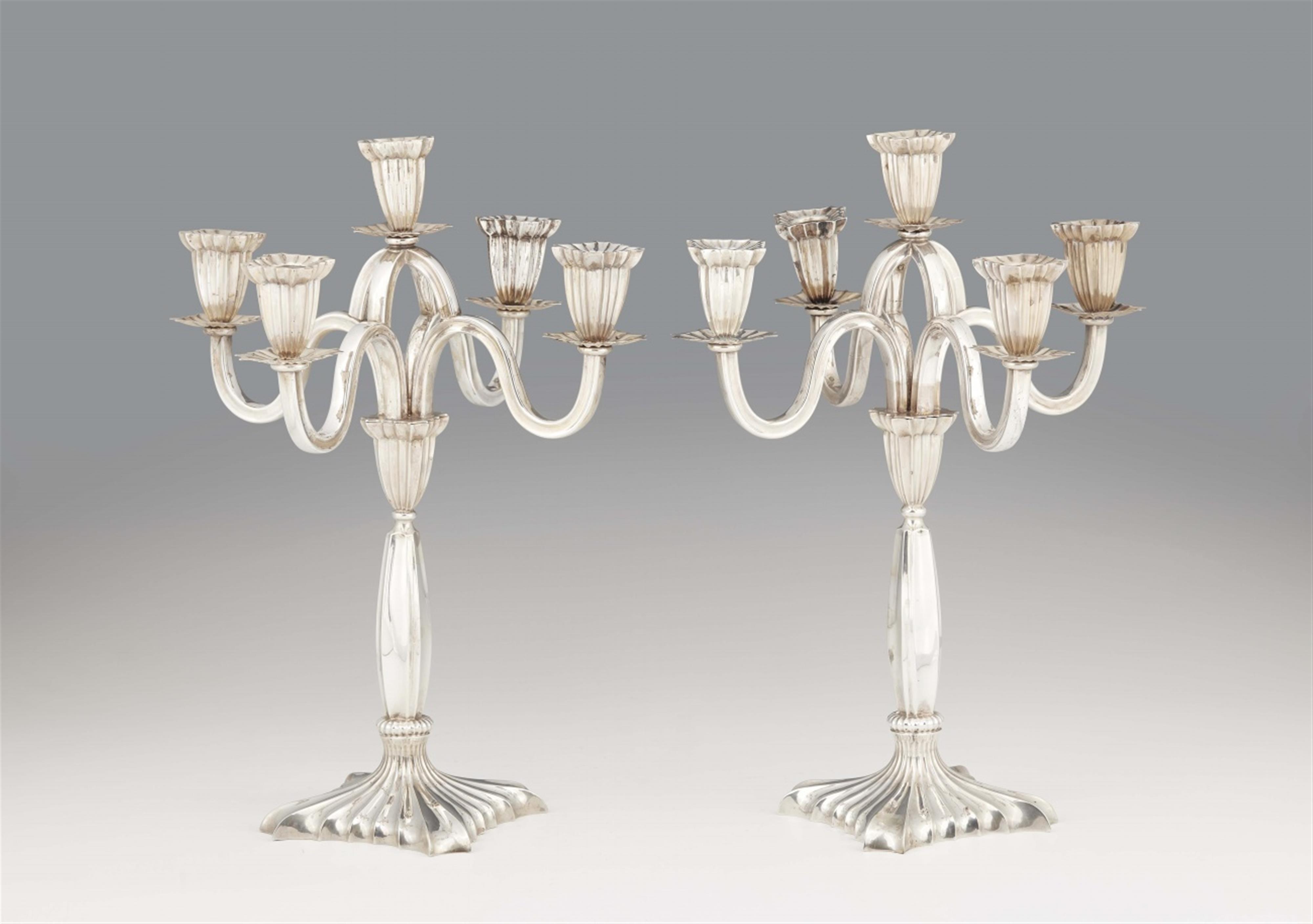 A pair of Linz silver candelabra - image-1