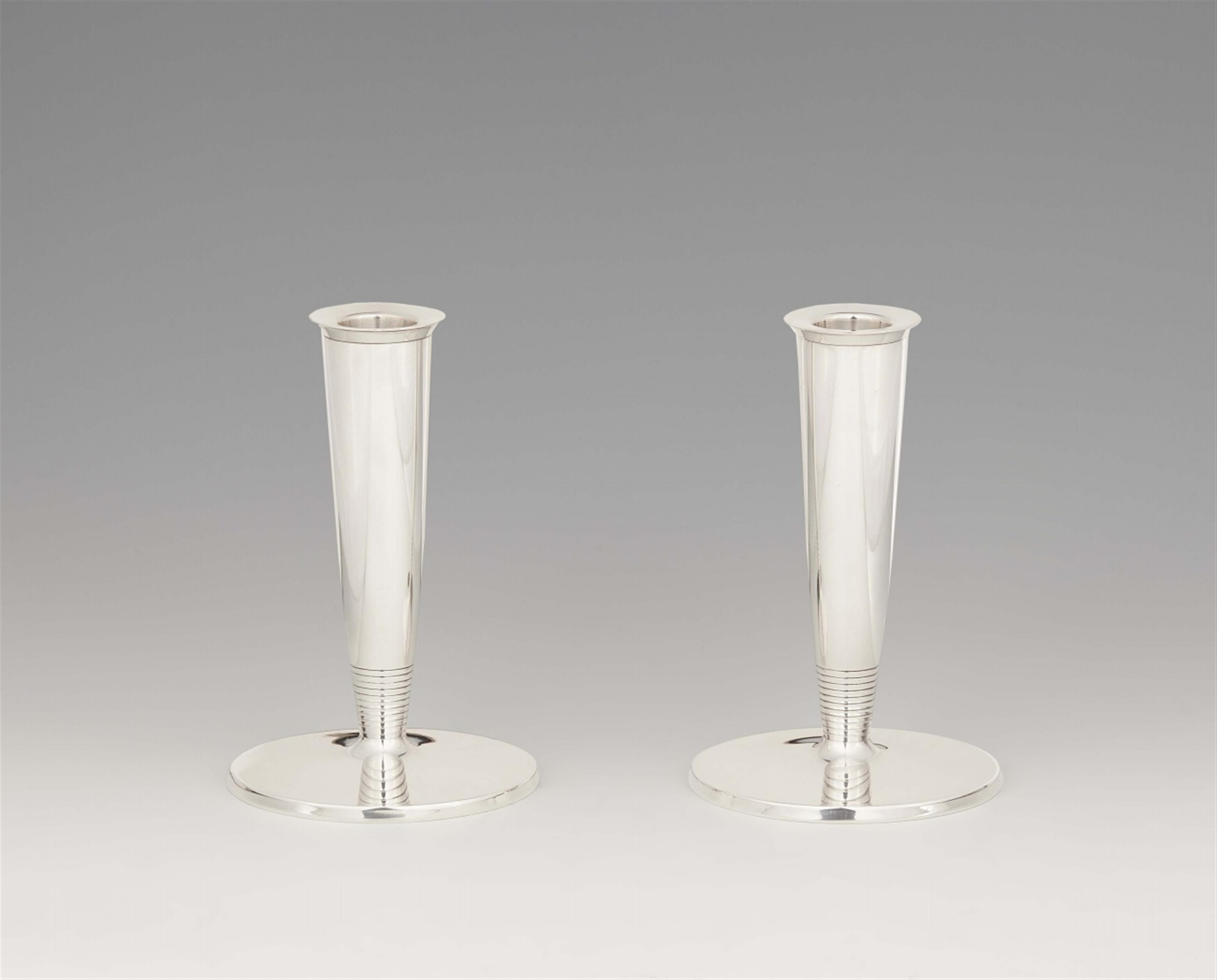 A pair of Copenhagen silver table candlesticks - image-1