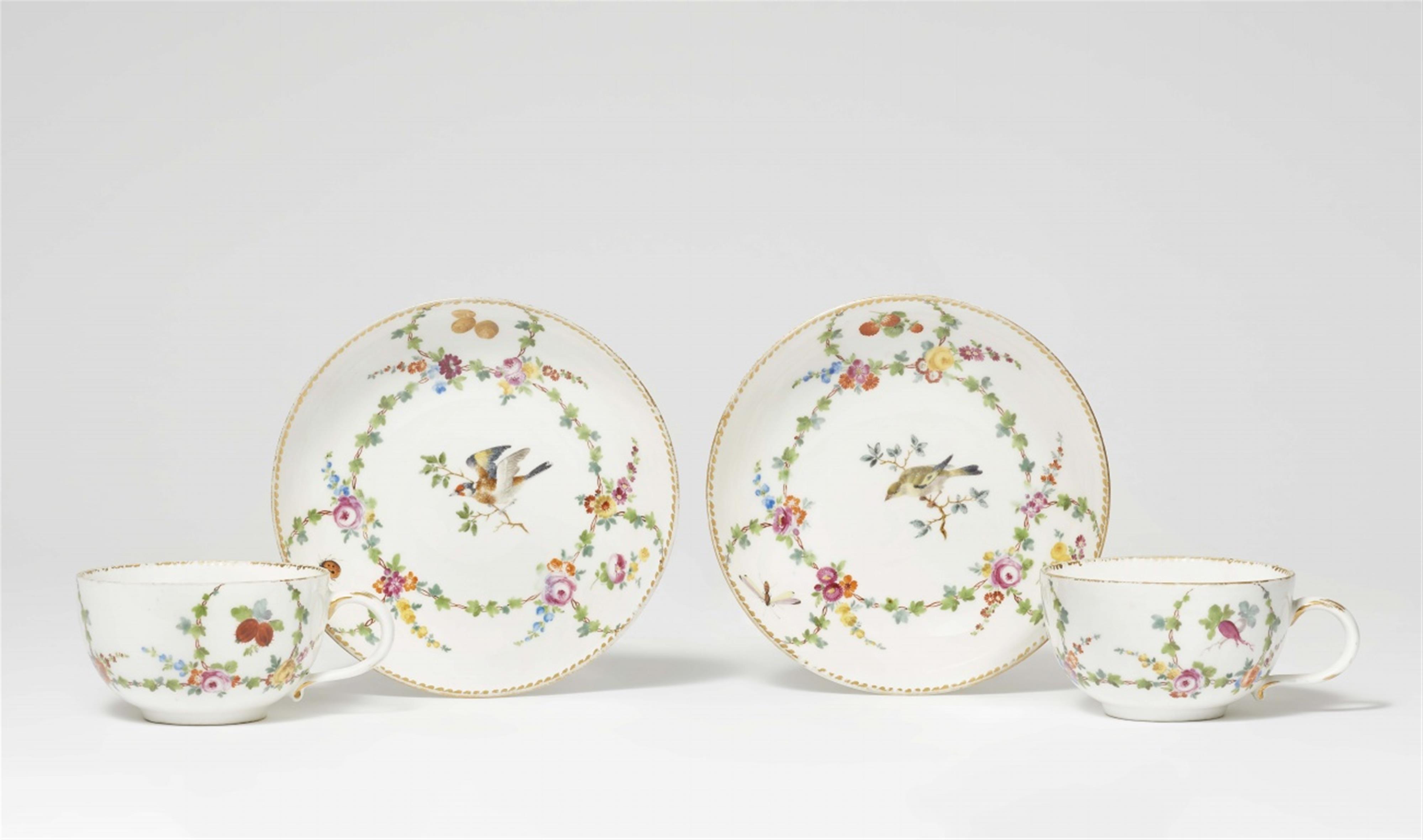 A pair of Meissen porcelain cups and saucers with birds - image-1