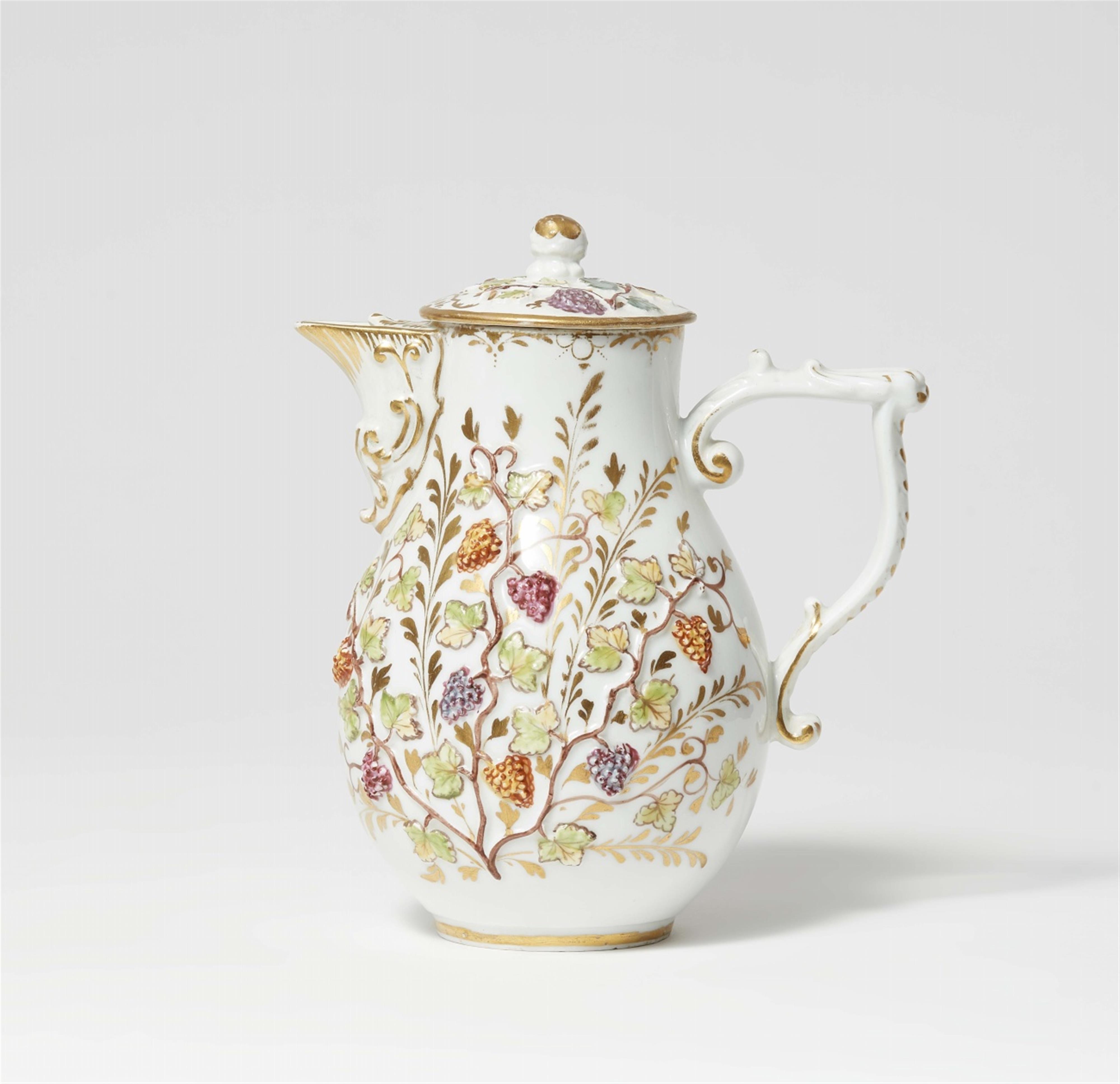 A Meissen porcelain pitcher with coloured grapevine reliefs - image-1