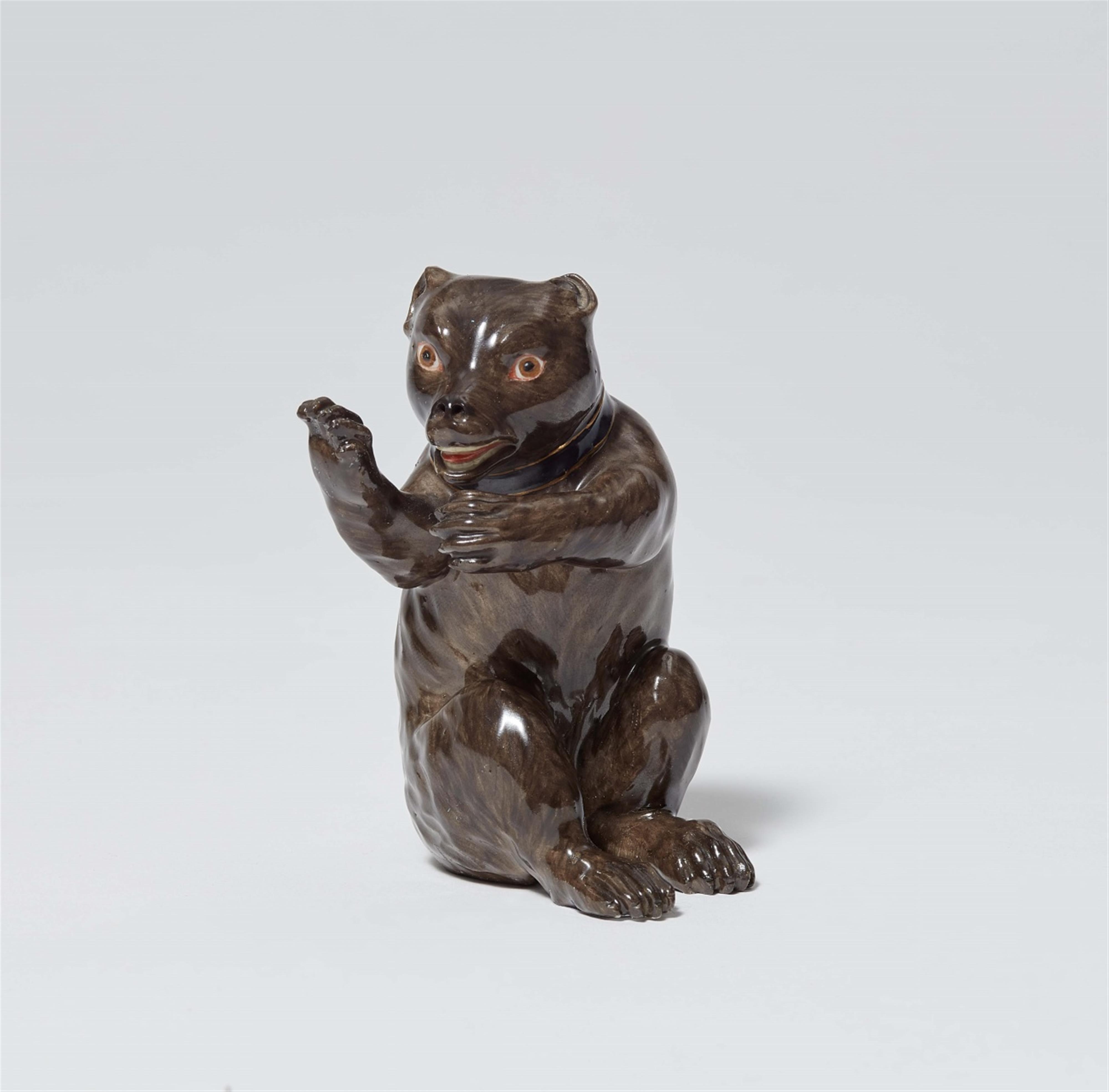 A Meissen porcelain model of a seated bear - image-1