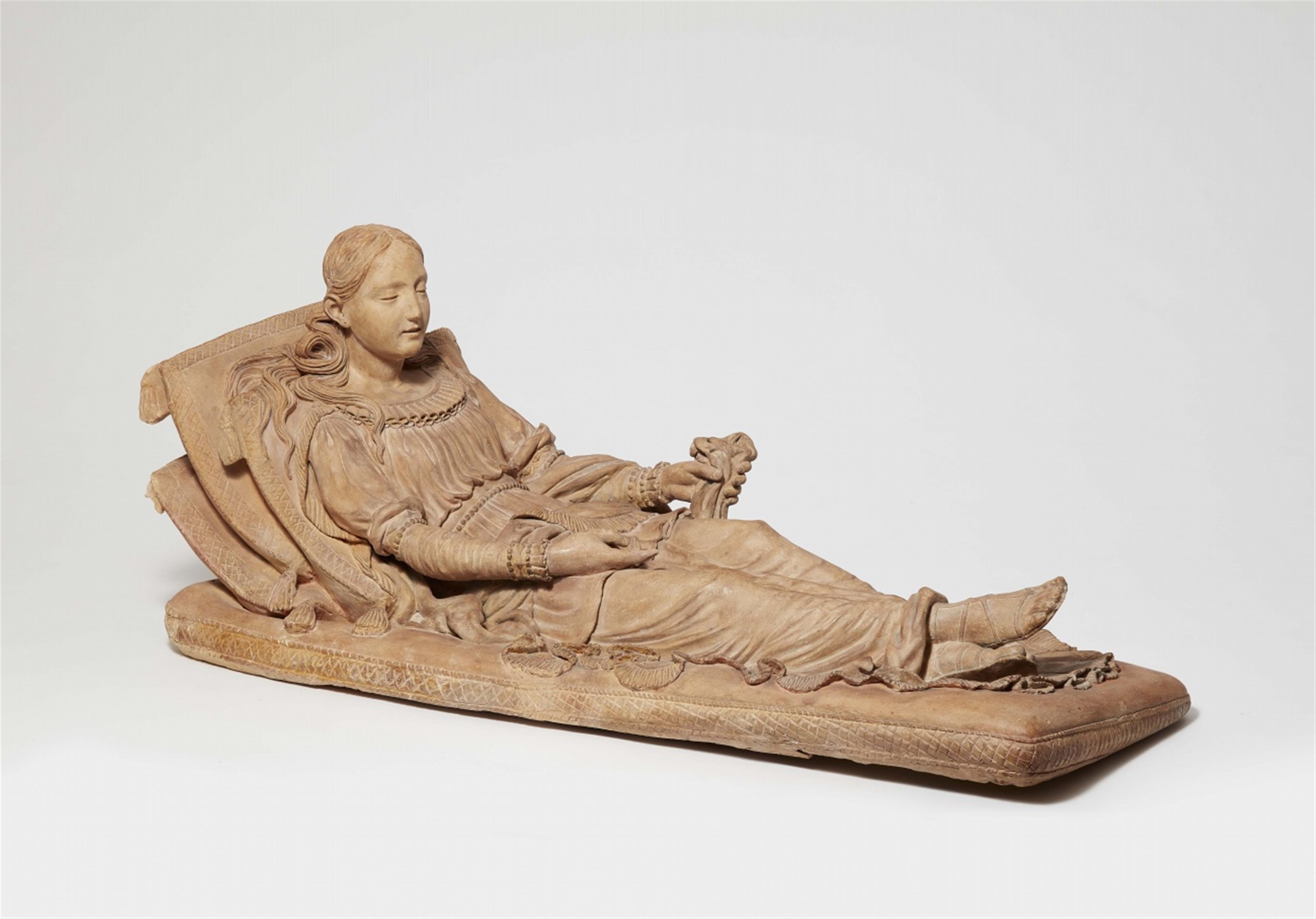 A terracotta model of a woman at rest - image-1