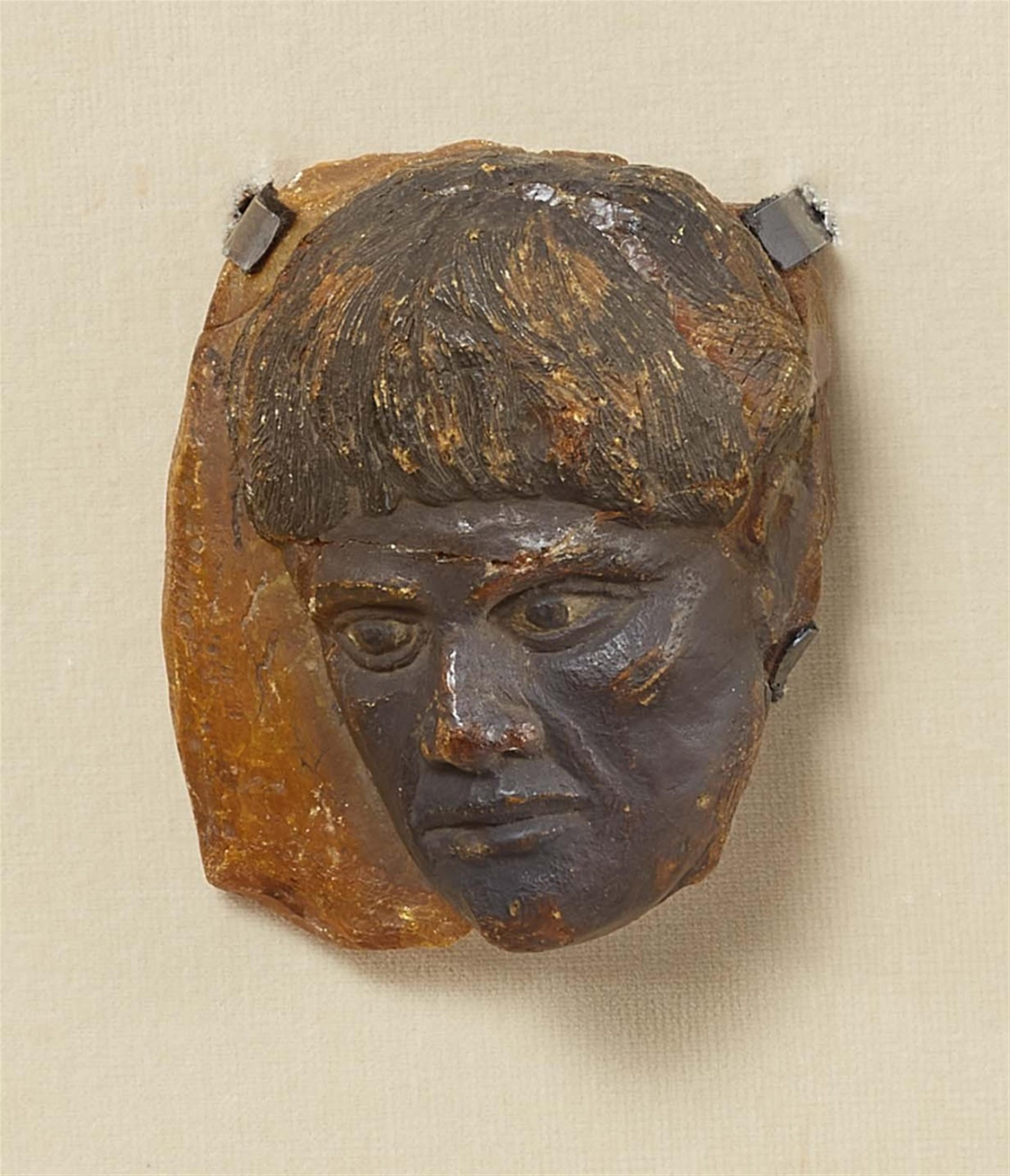 A carved marble head of a youth - image-2