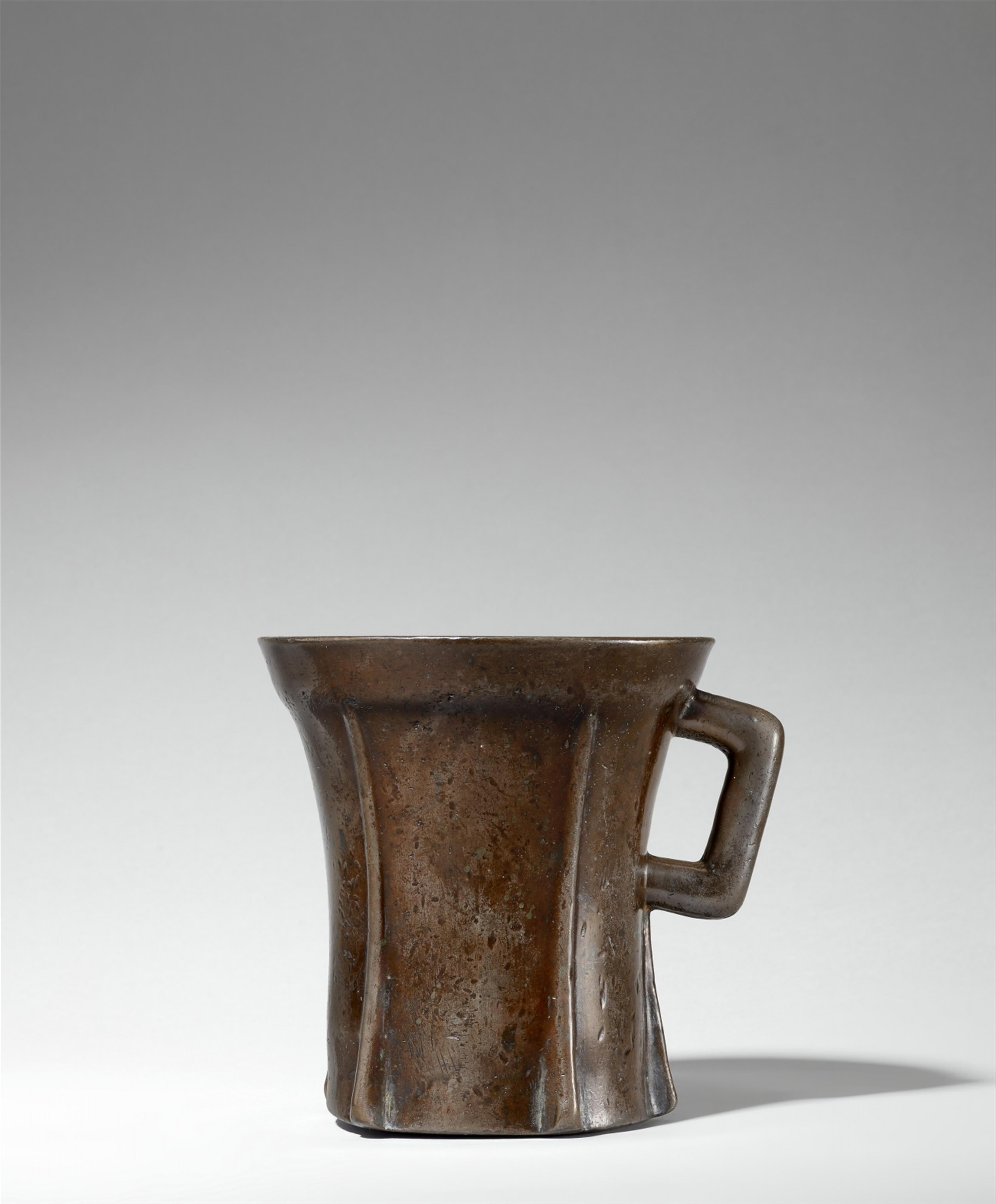 A Gothic single-handled mortar with bracket feet - image-1