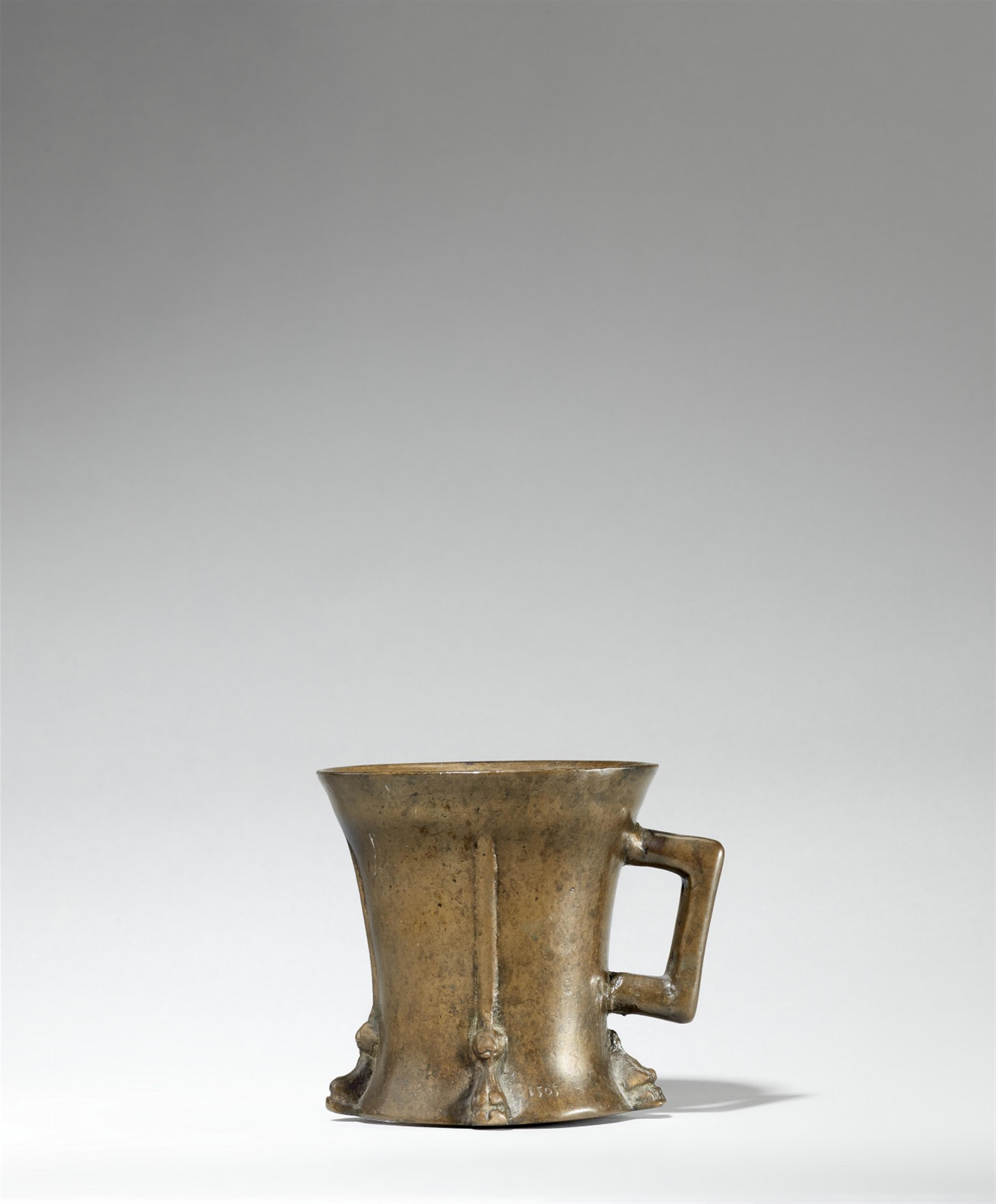 A dated Gothic single-handled mortar with lion mascarons - image-1