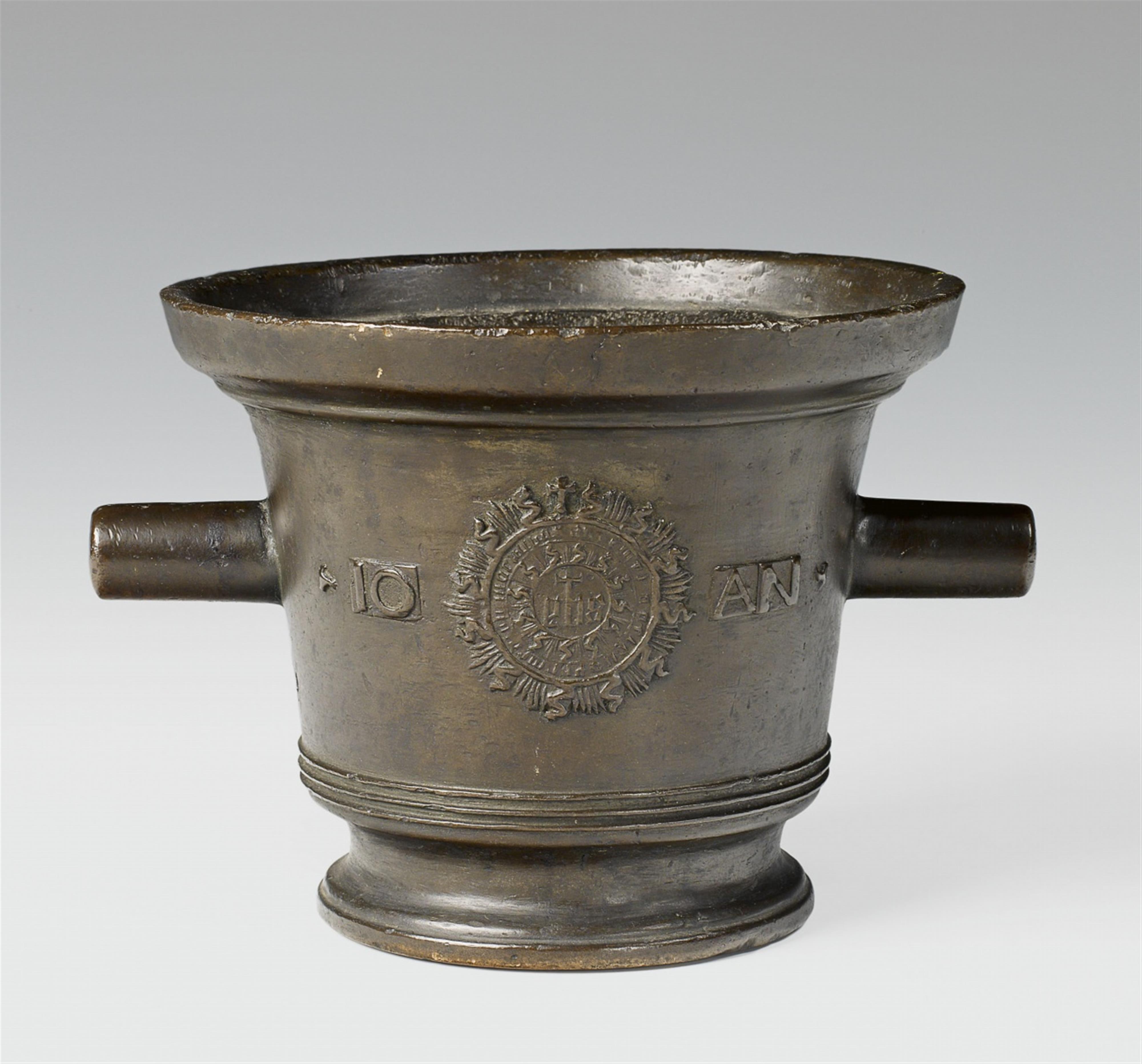 A cast bronze mortar decorated with a lion and Christogram - image-2
