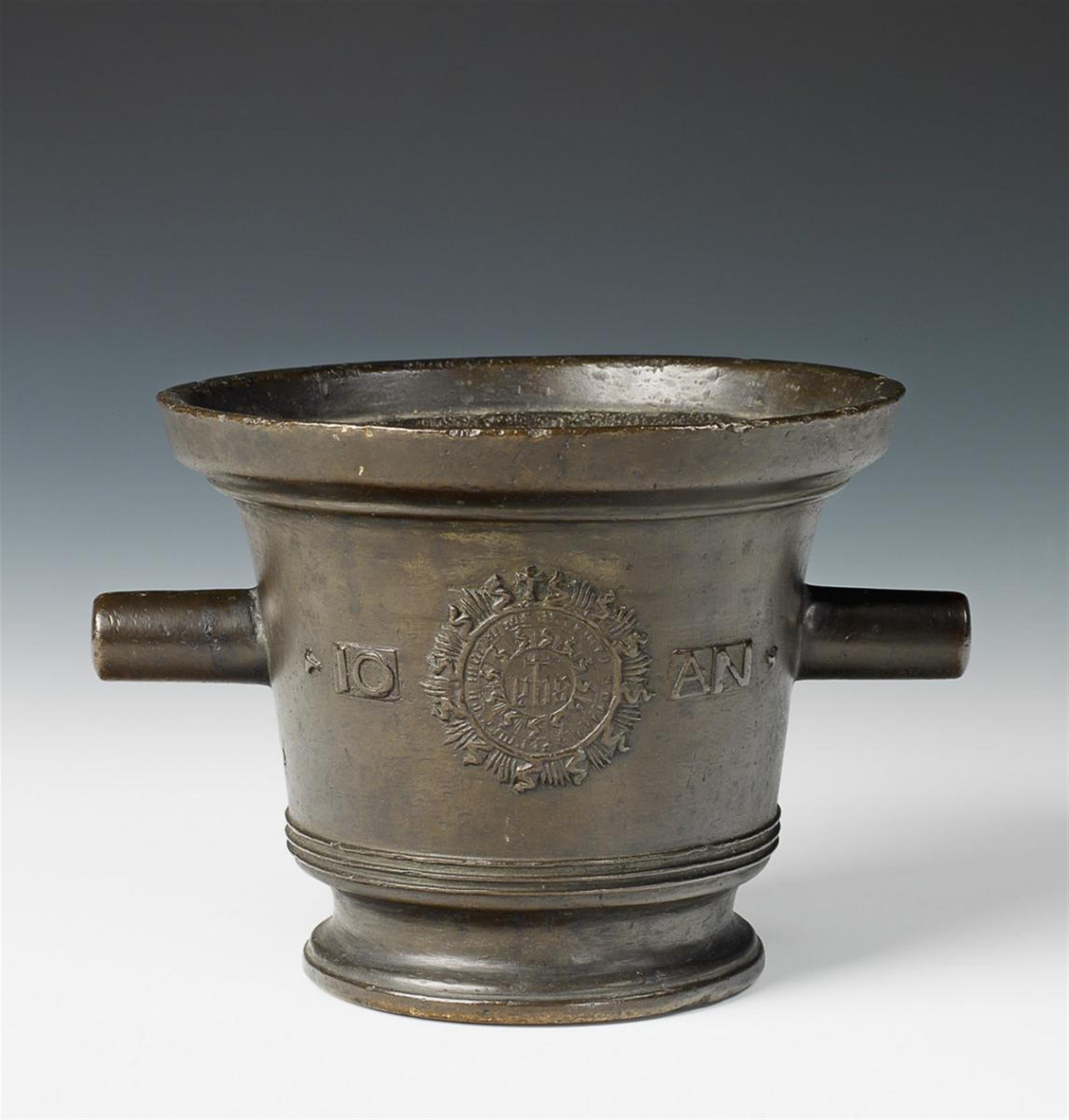 A cast bronze mortar decorated with a lion and Christogram - image-1