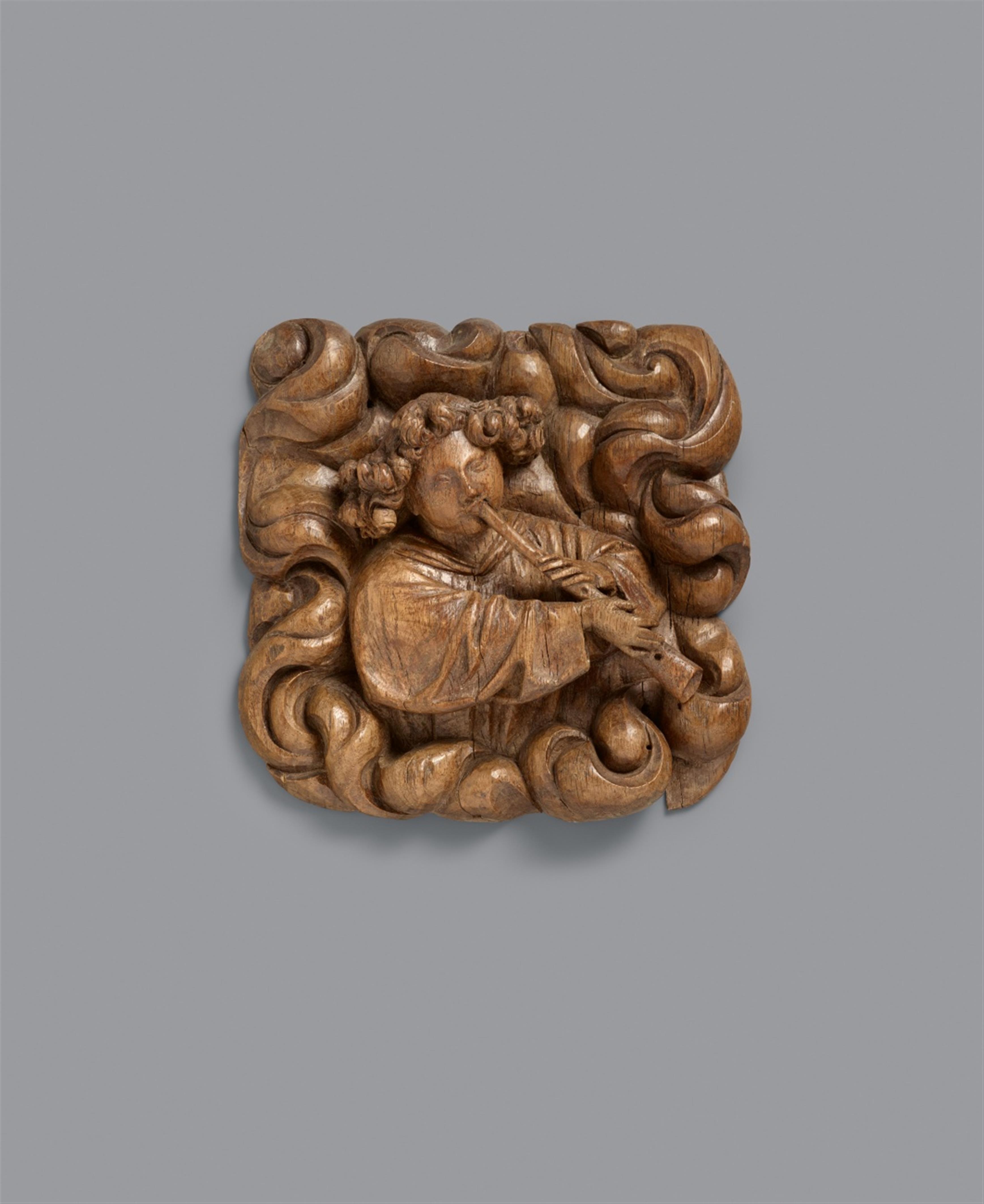 Probably Lower Rhine Region Late 15th century - A late 15th century carved wood relief of an angel with a flute, presumably Lower Rhine Region - image-1