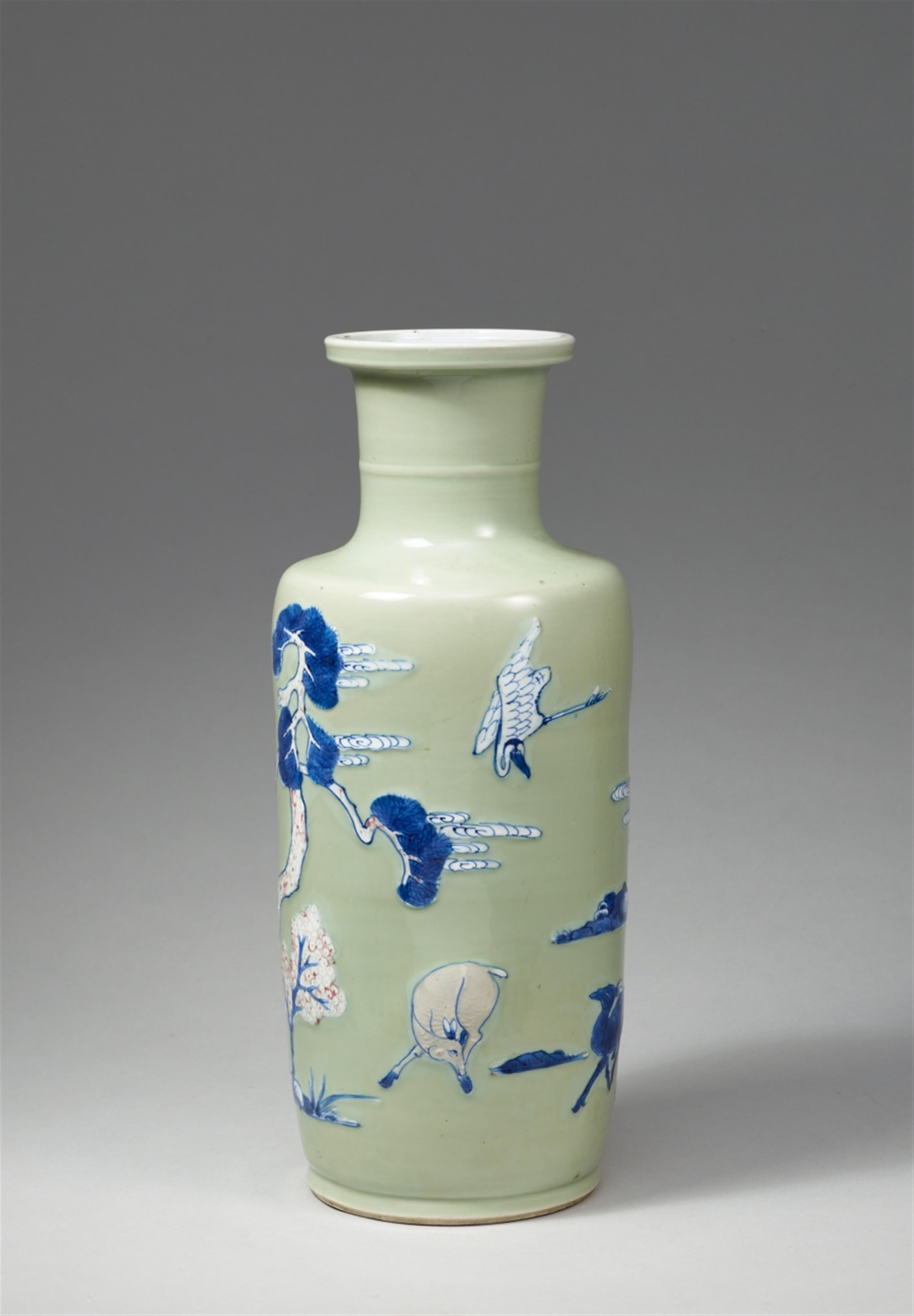 A blue and white, underglaze copper-red and white-slip-decorated celadon-ground rouleau vase. Kangxi period (1662-1722) - image-4