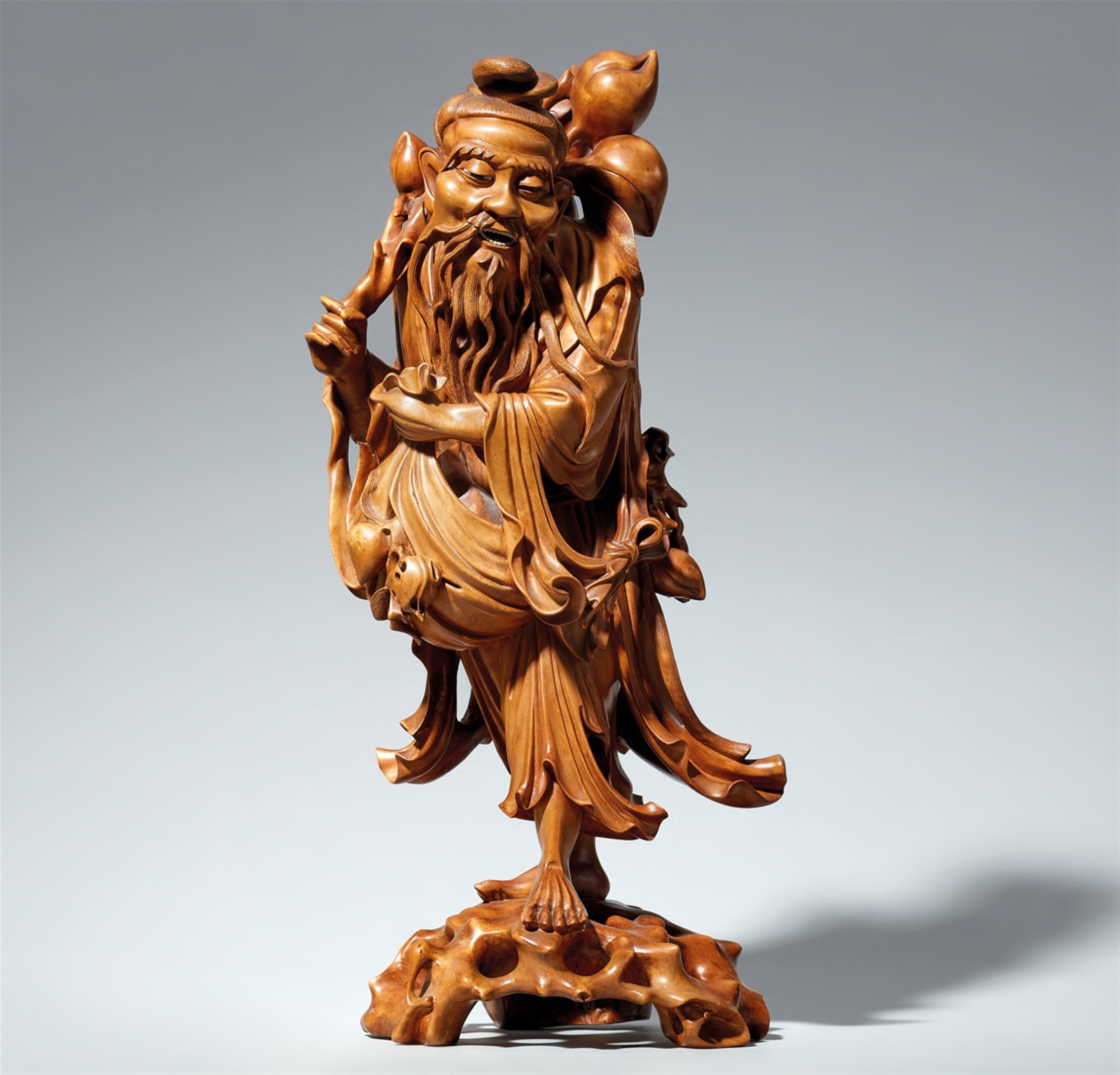 A wood figure of the immortal Tong Fangshuo. Late 19th/early 20th century - image-1