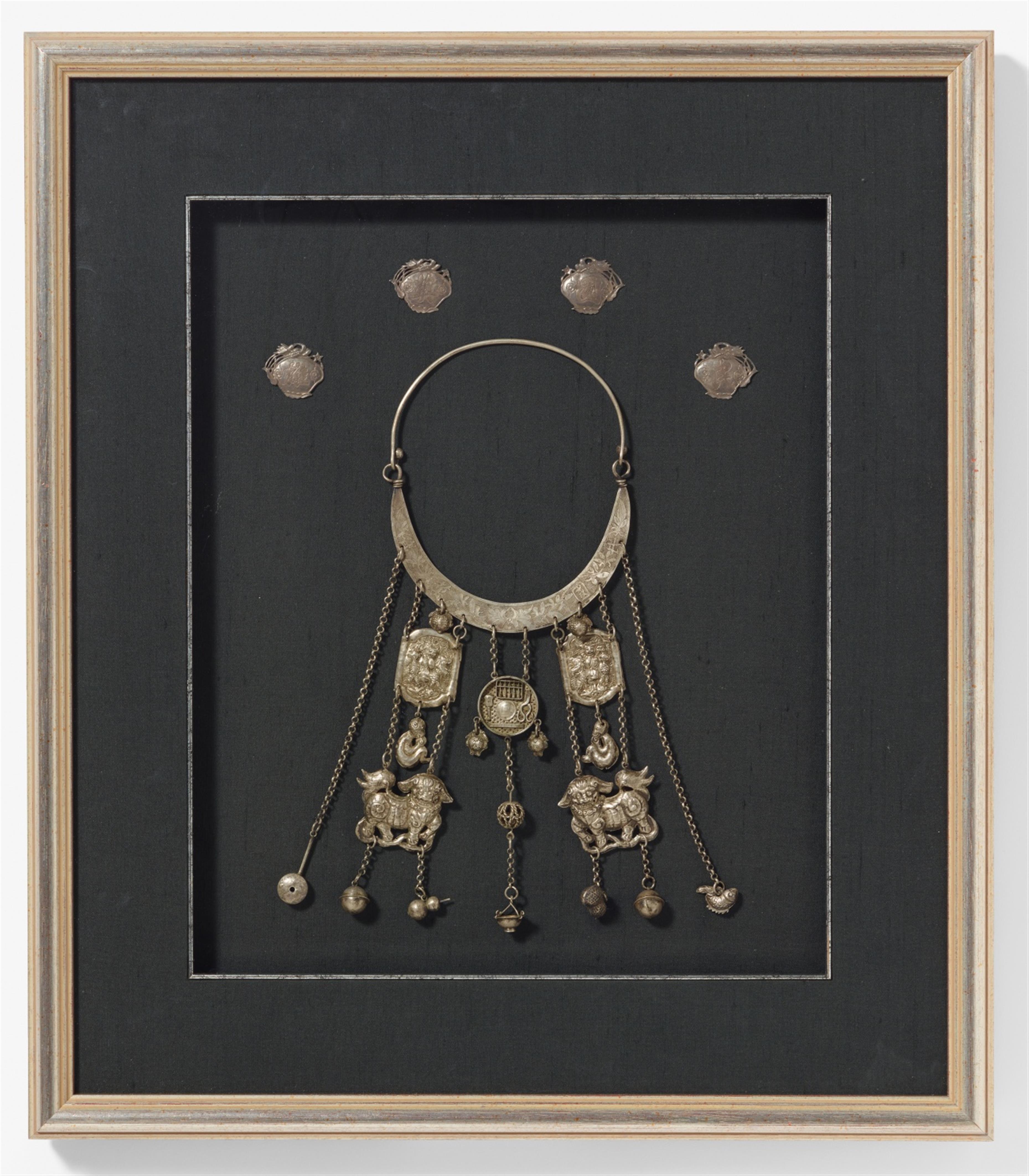 A silver neck ornament with amulets. Early 20th century - image-1