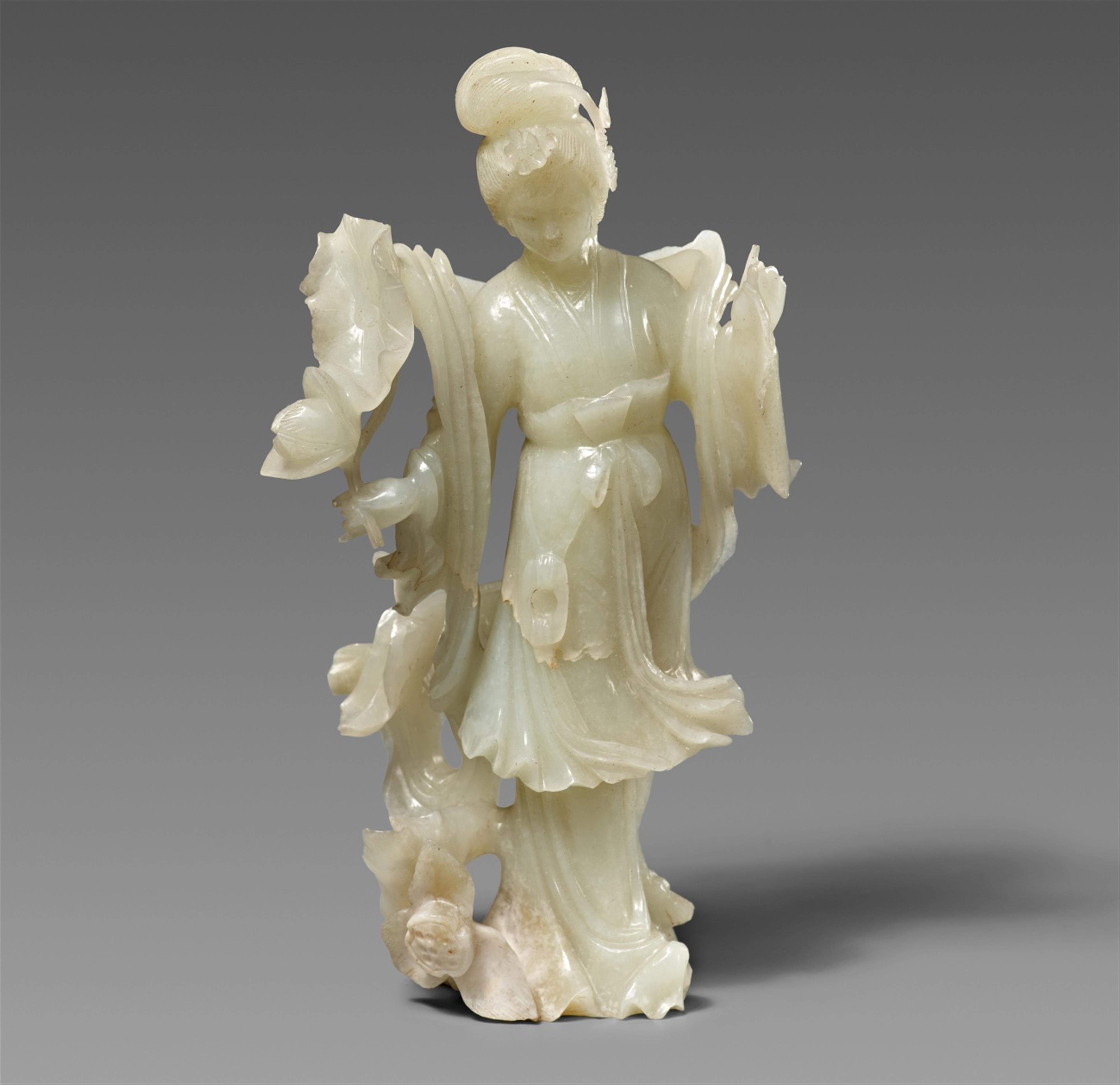 A pale celadon jade carving of a standing lady. Mid 20th century - image-1