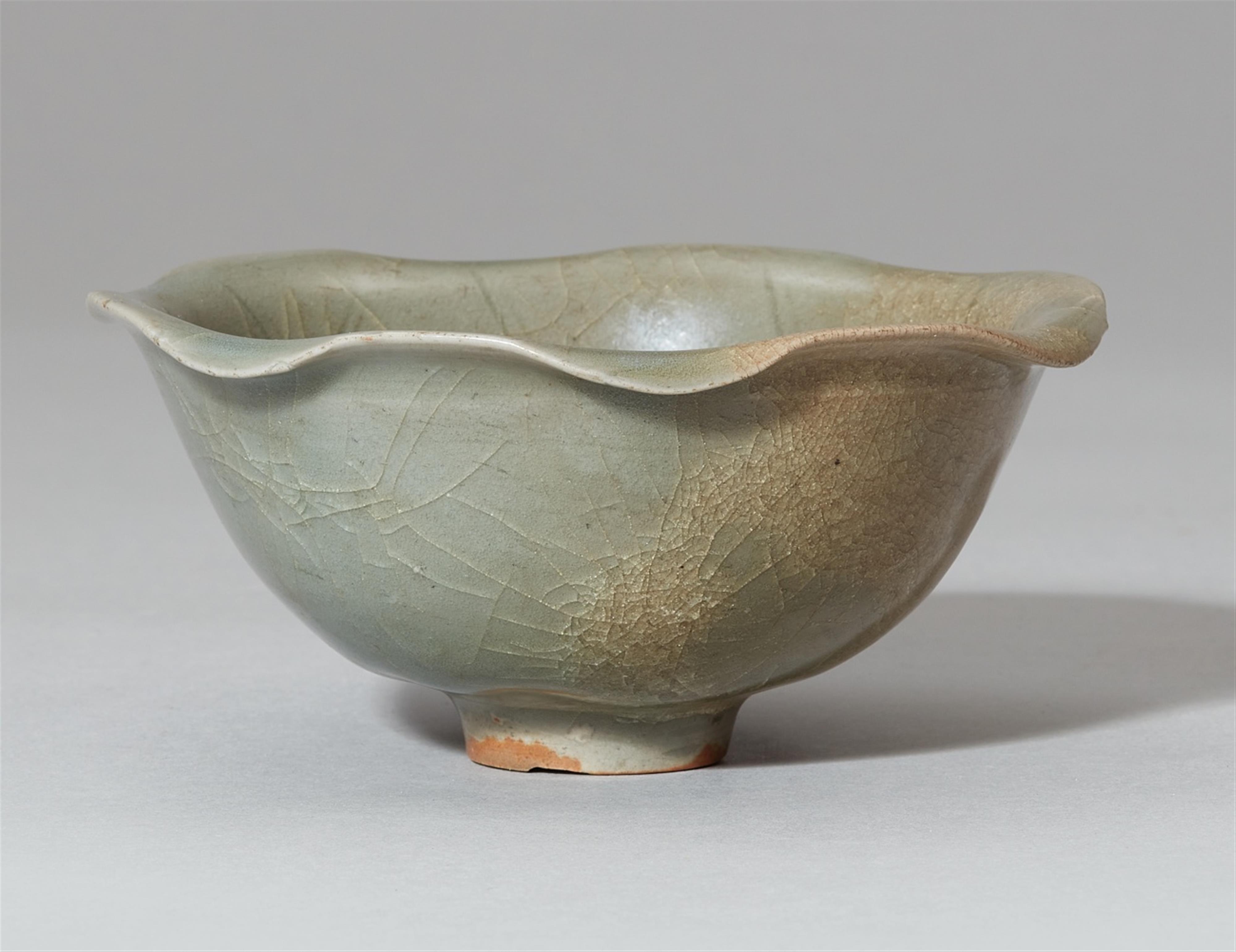 A Longquan celadon lotus and tortoise bowl. Song dynasty (907-1279) - image-1