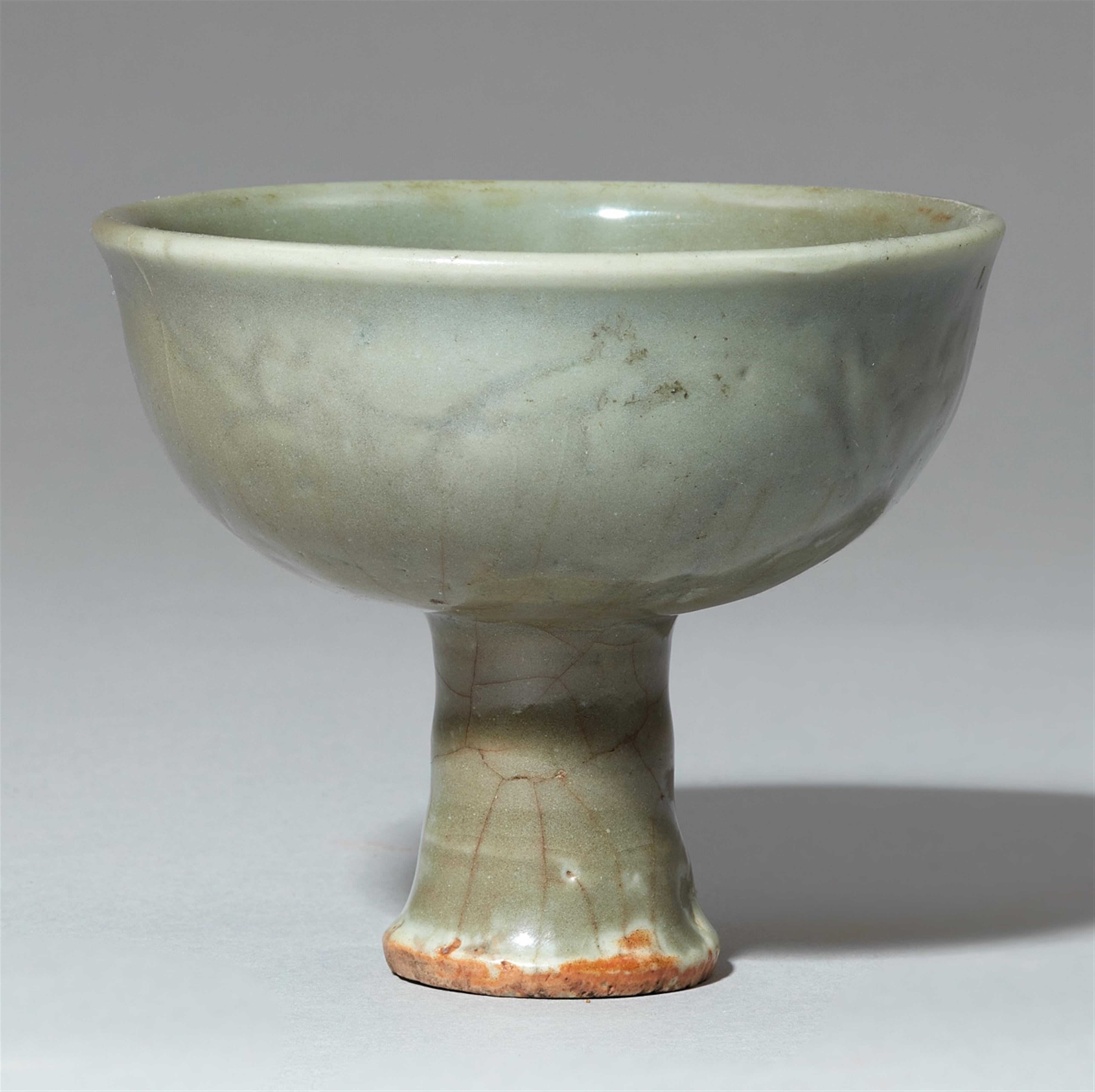 A Longquan celadon-glazed stemcup. Longquan. 14th/15th century - image-1