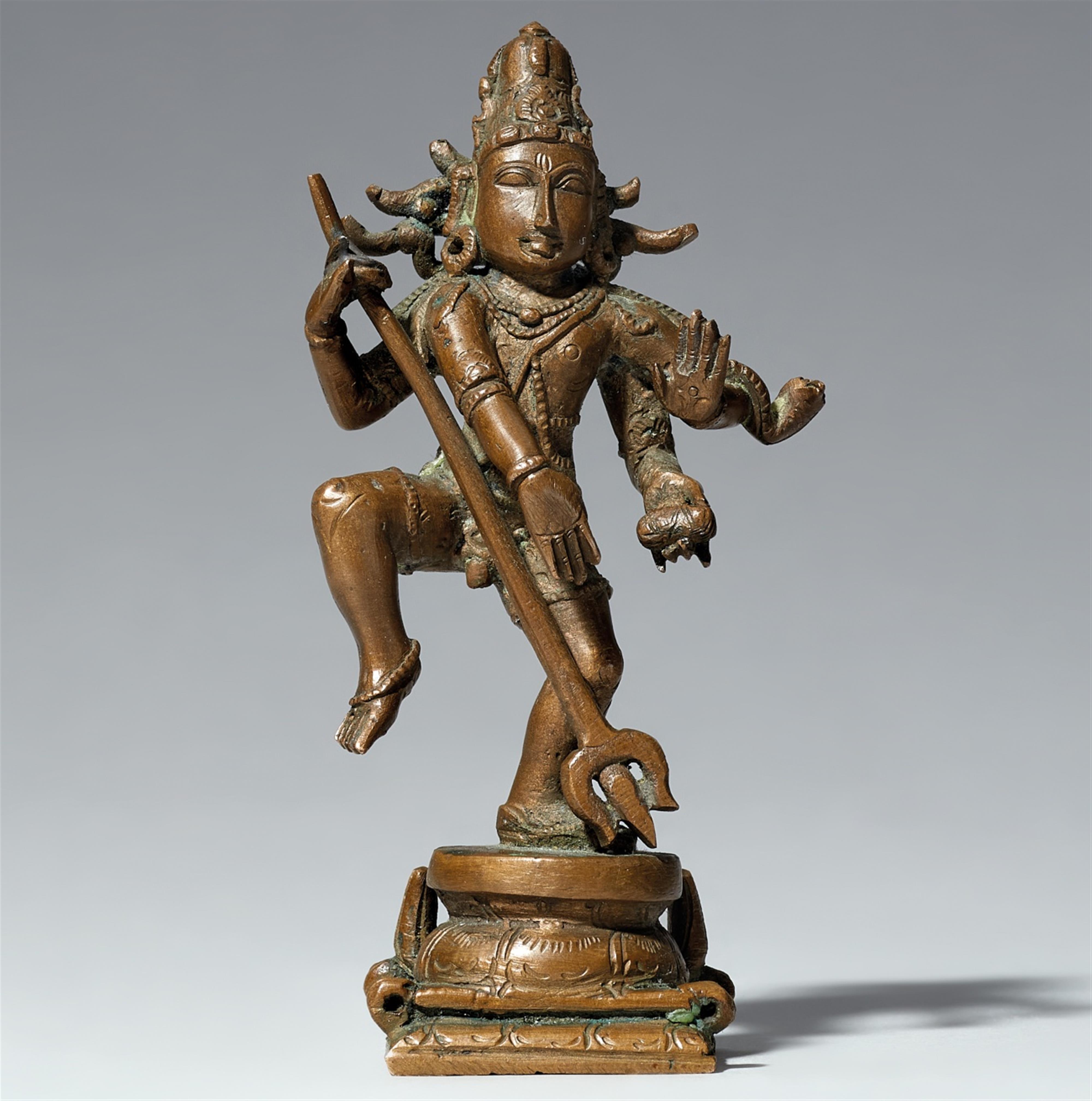 A South Indian copper alloy figure of a dancing Shiva. 20th century - image-1