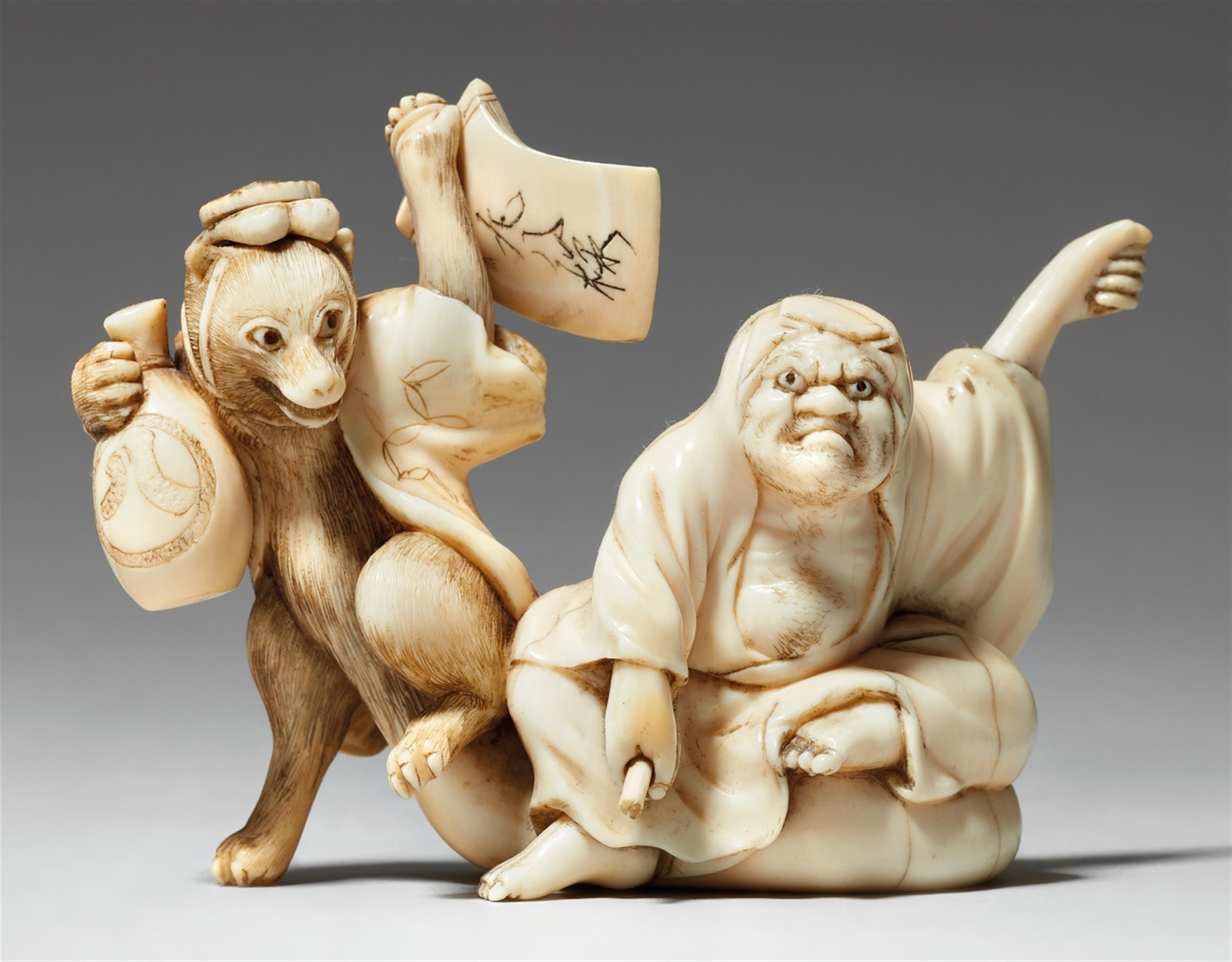 An ivory okimono of Daruma and tanuki. Late 19th century - image-1