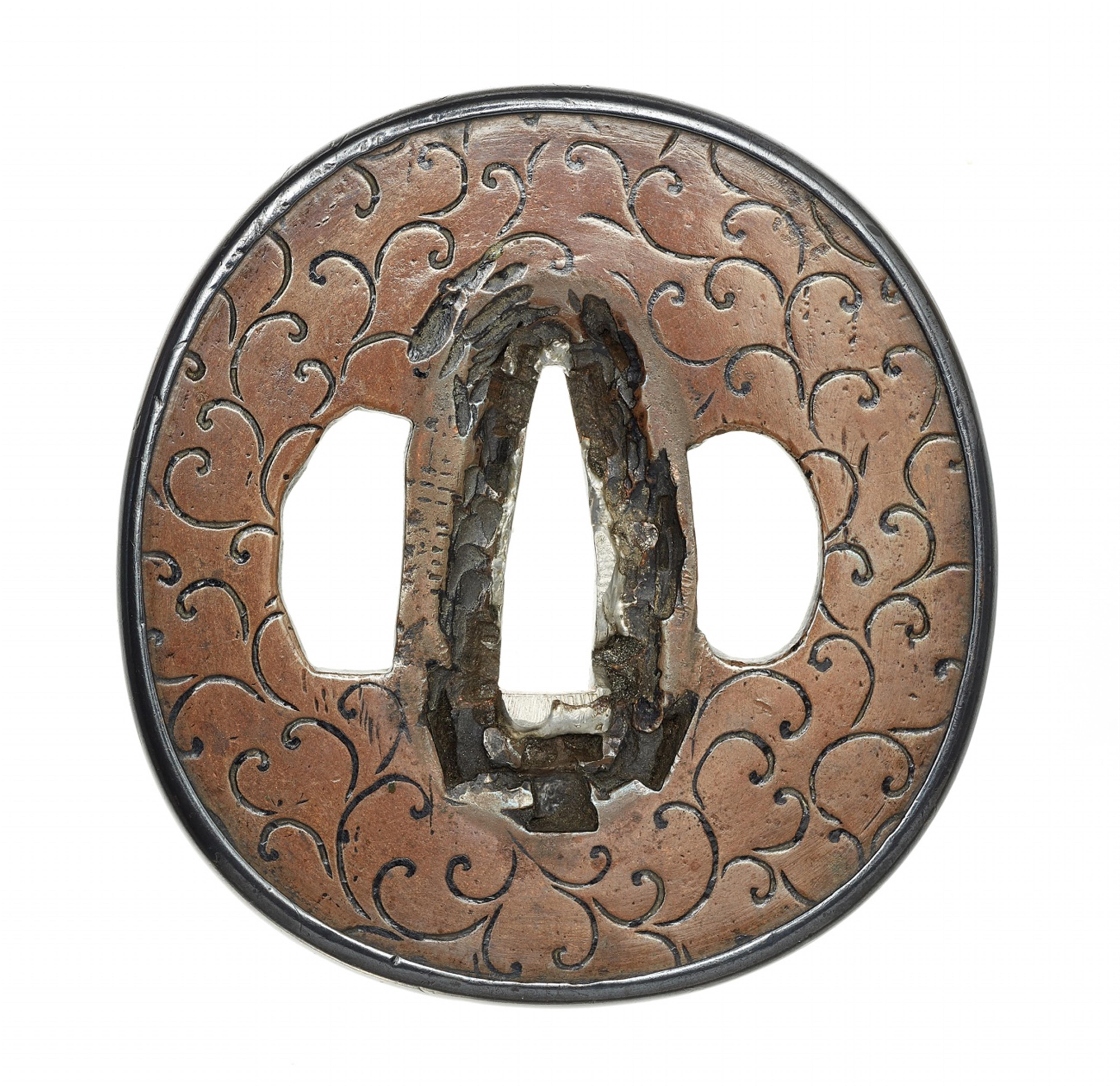 A Ko-Shôami copper tsuba. Edo period, 17th century

 - image-1