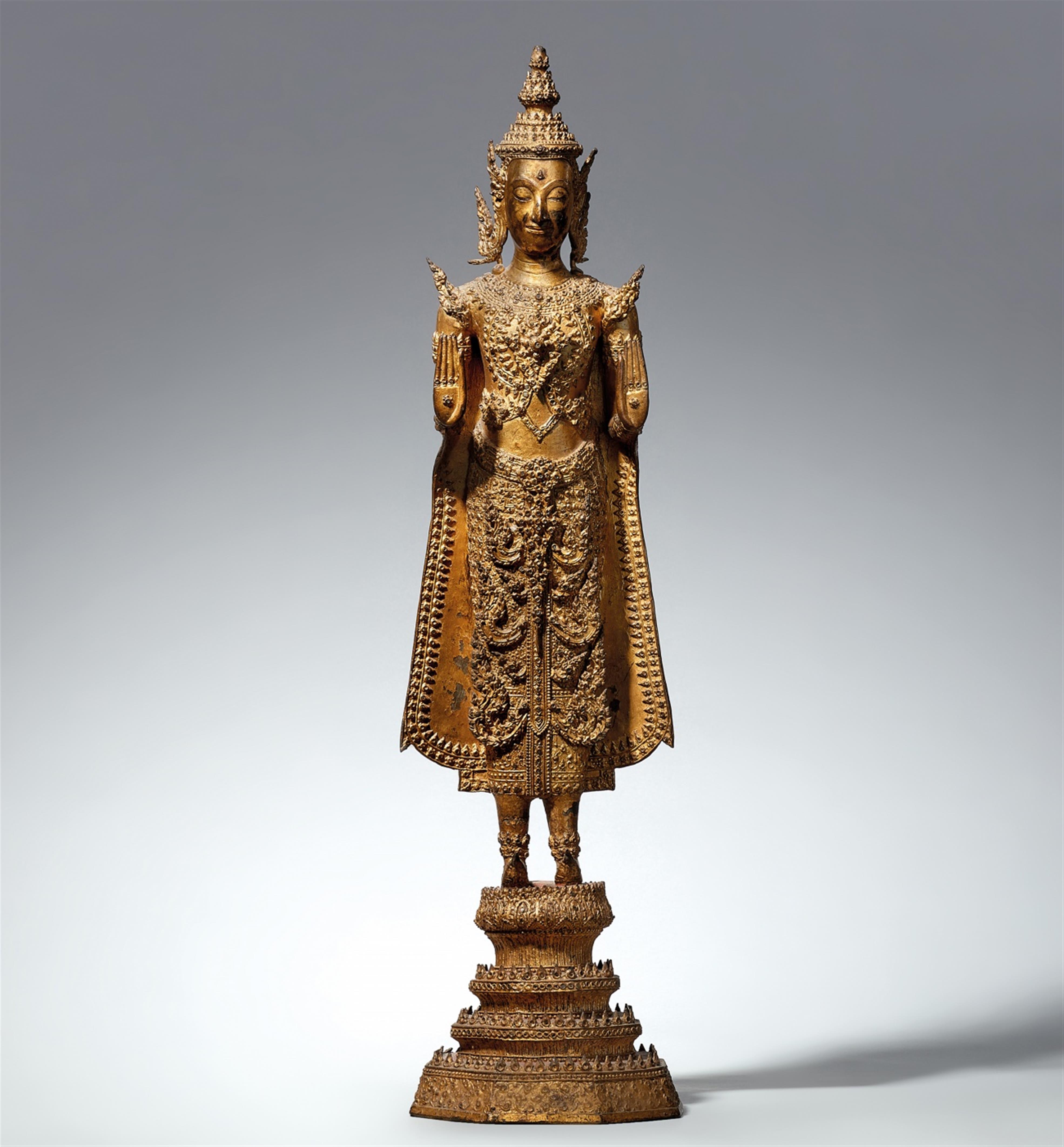 A Ratanakosin gilded and lacquered bronze figure of a bejewelled Buddha Shakyamuni. Thailand. 19th century - image-1