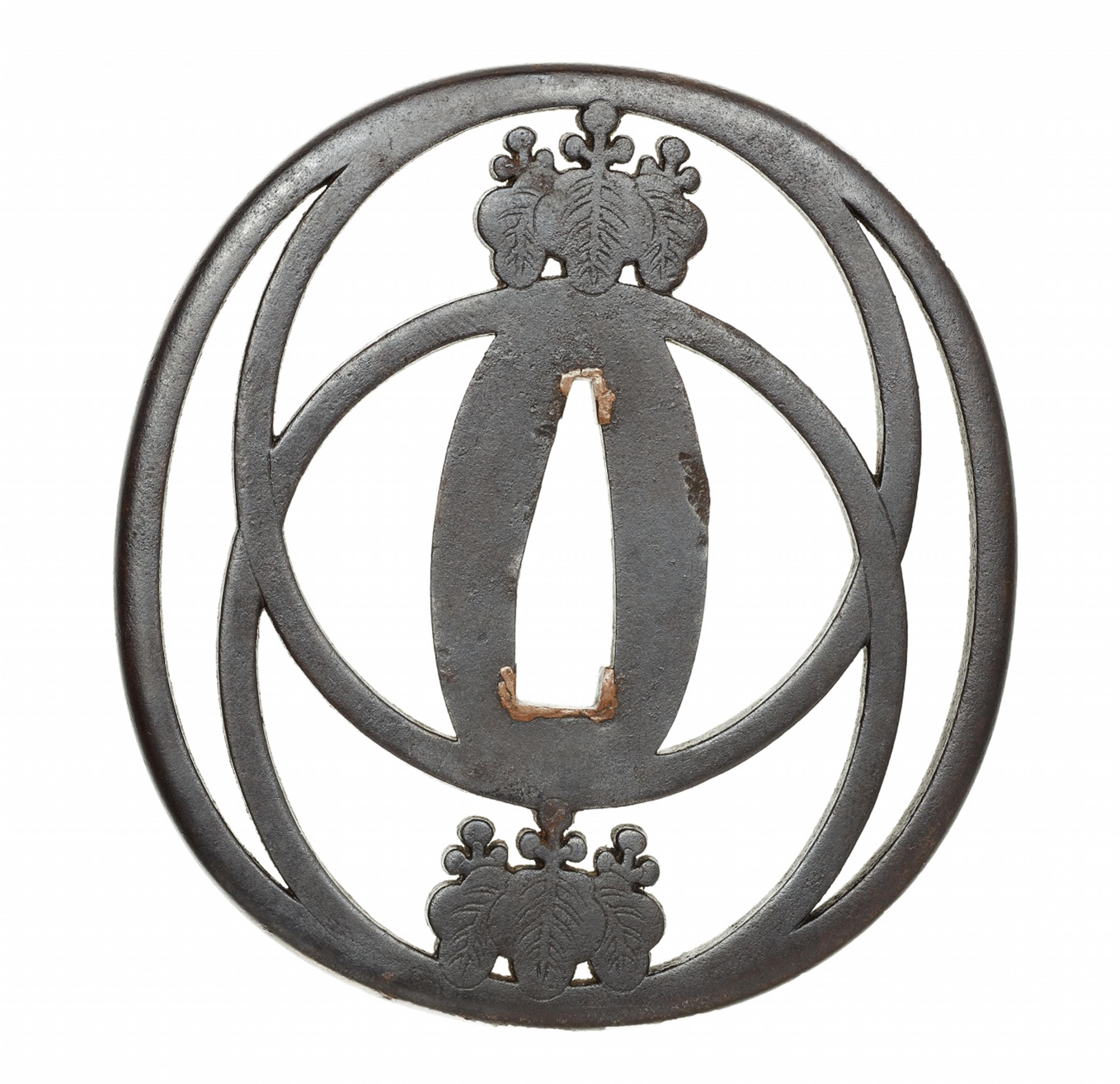 A Kamiyoshi iron tsuba. Edo period, first half 19th century

 - image-1