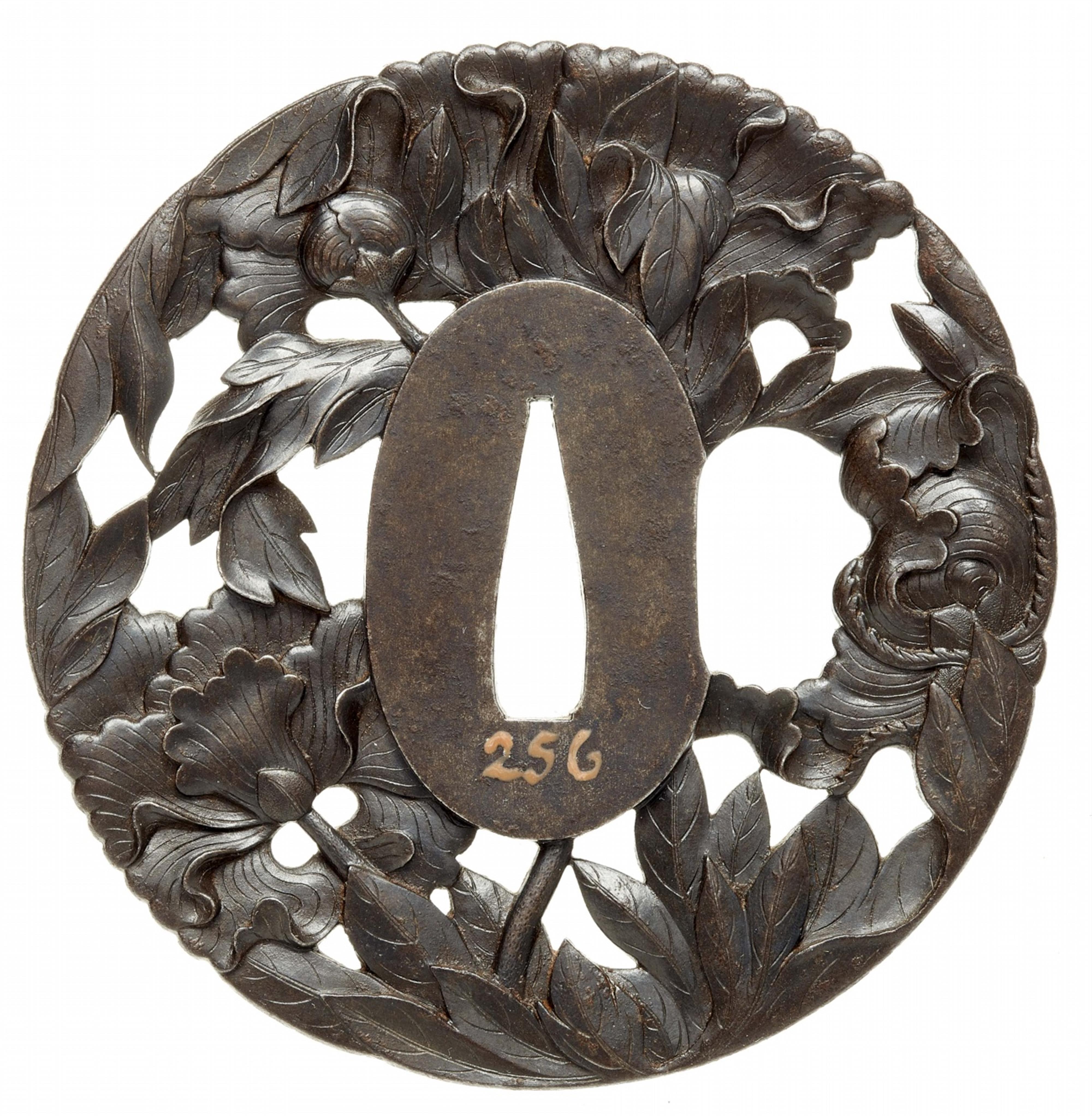 An iron tsuba. Edo period, second half 18th century - image-2