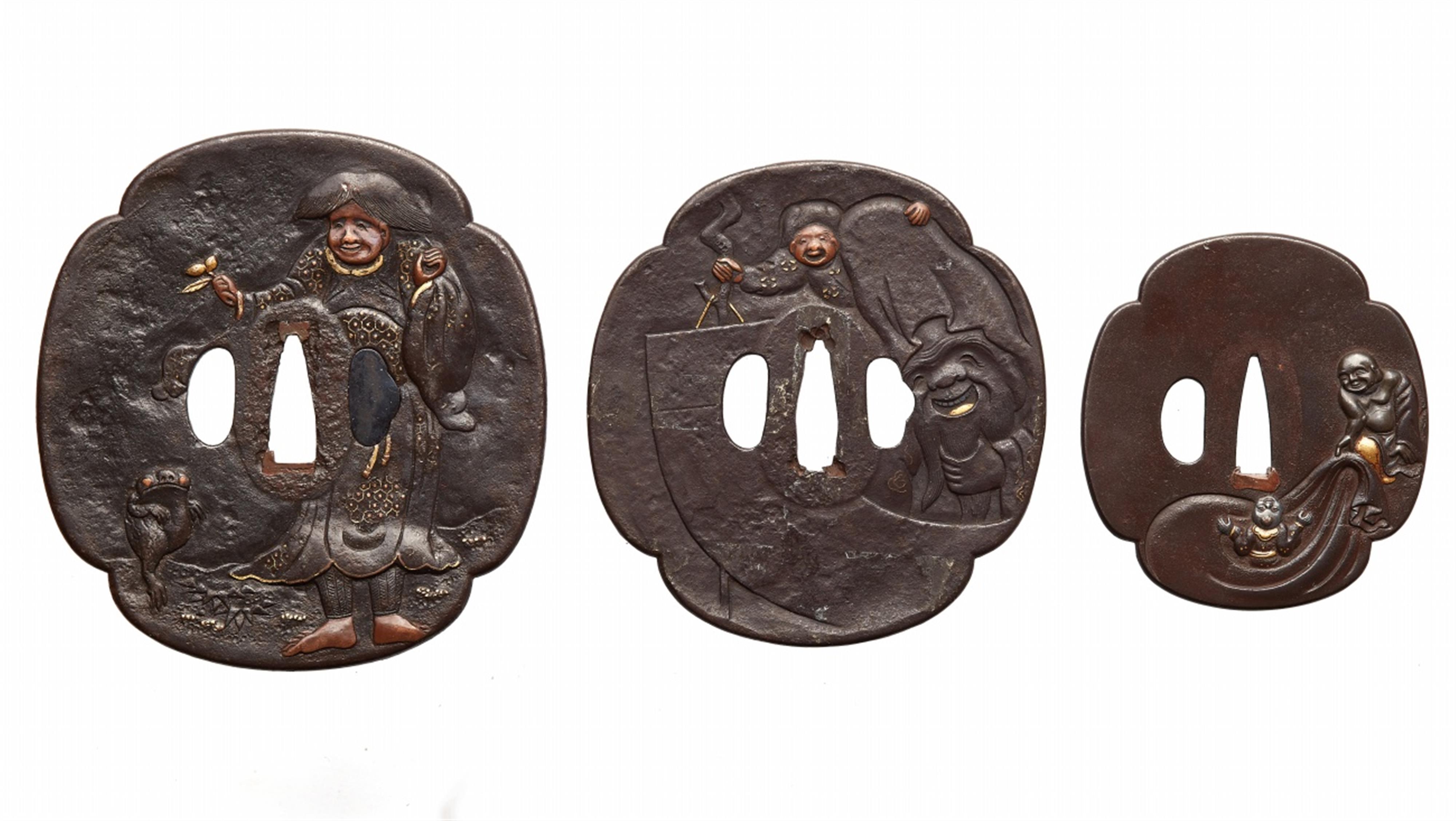 A pair of large iron daishô tsuba and one iron tsuba. 19th century - image-1