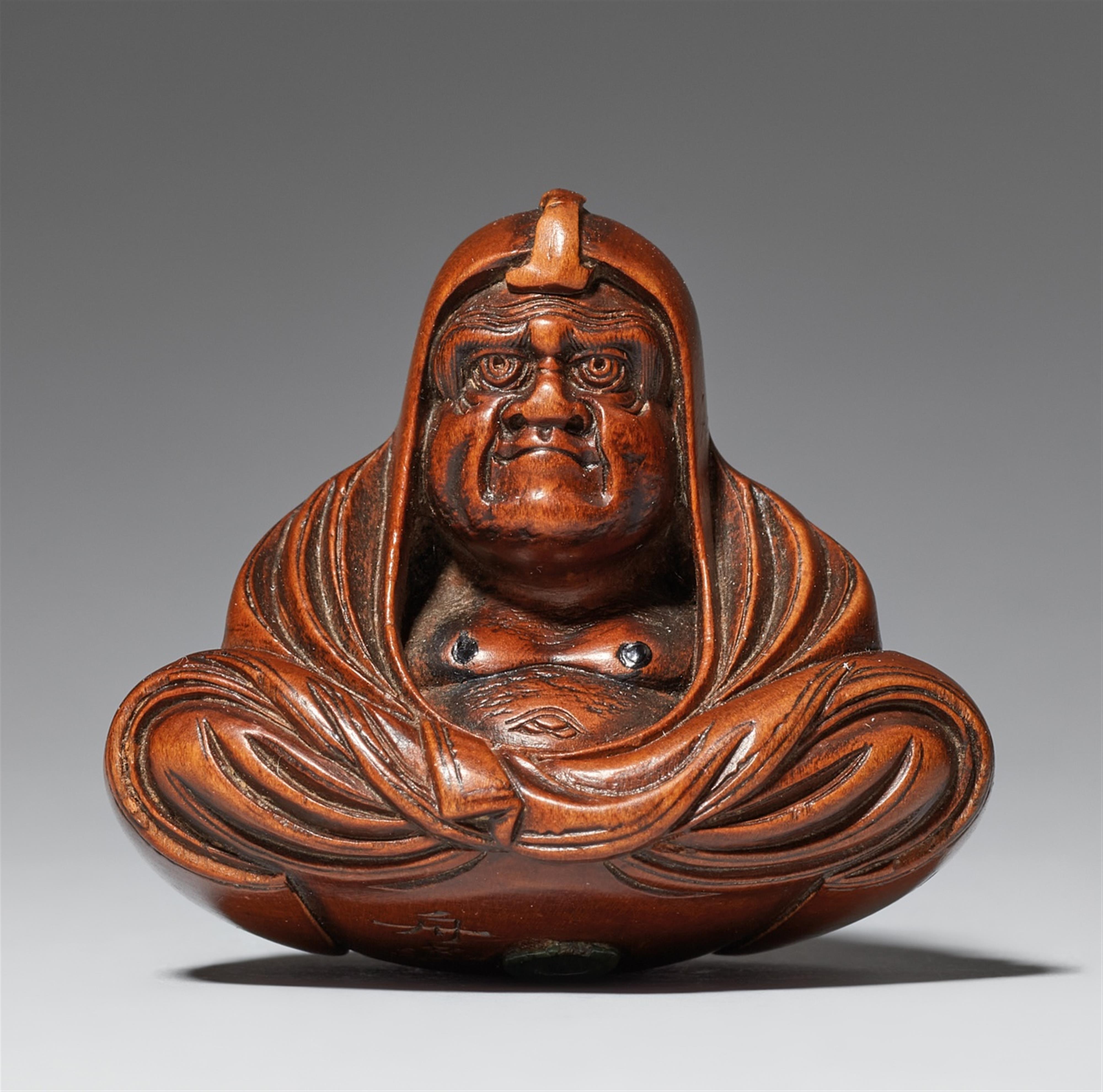 Daruma playing kamifuki. Boxwood. Mid-19th century - image-1