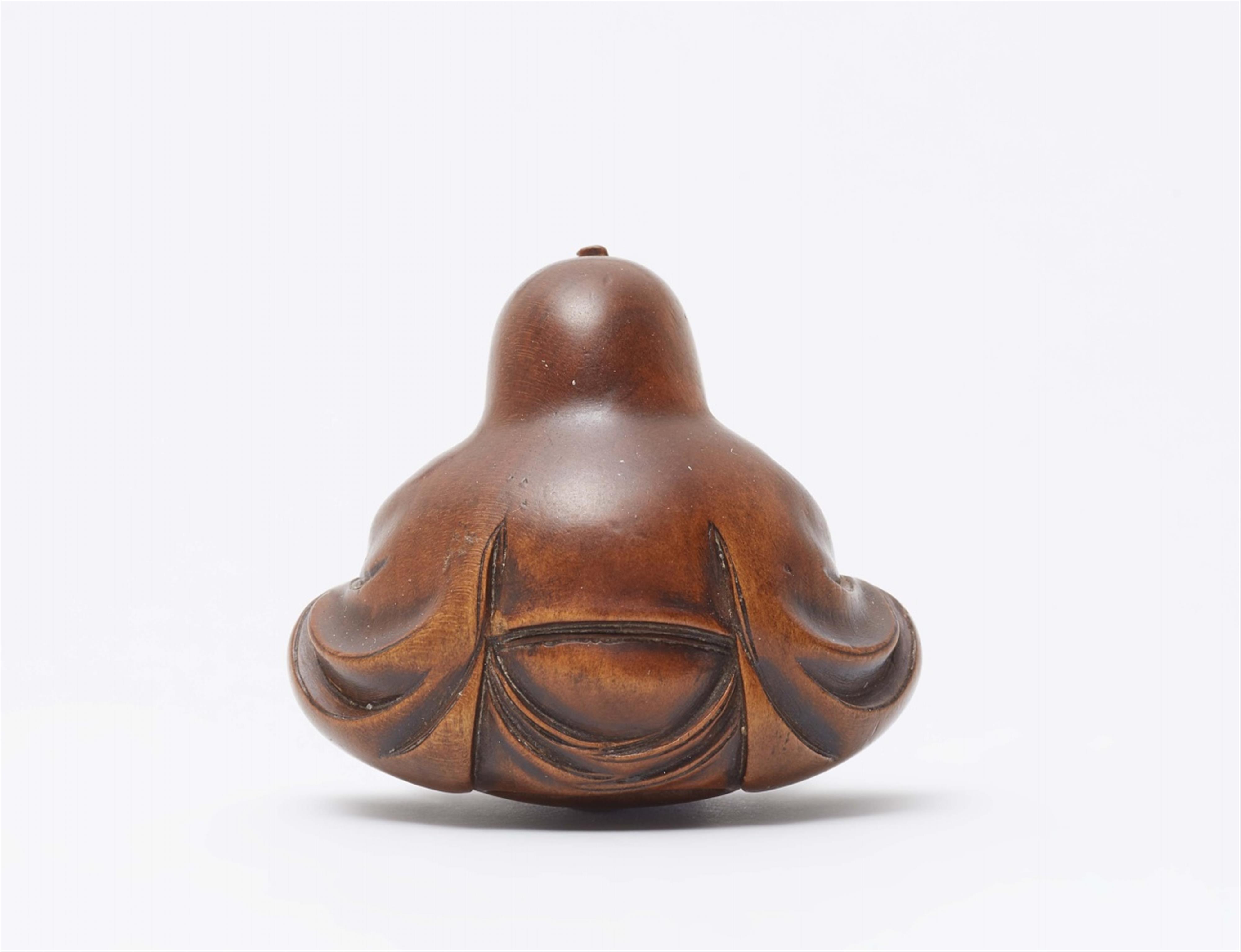 Daruma playing kamifuki. Boxwood. Mid-19th century - image-3