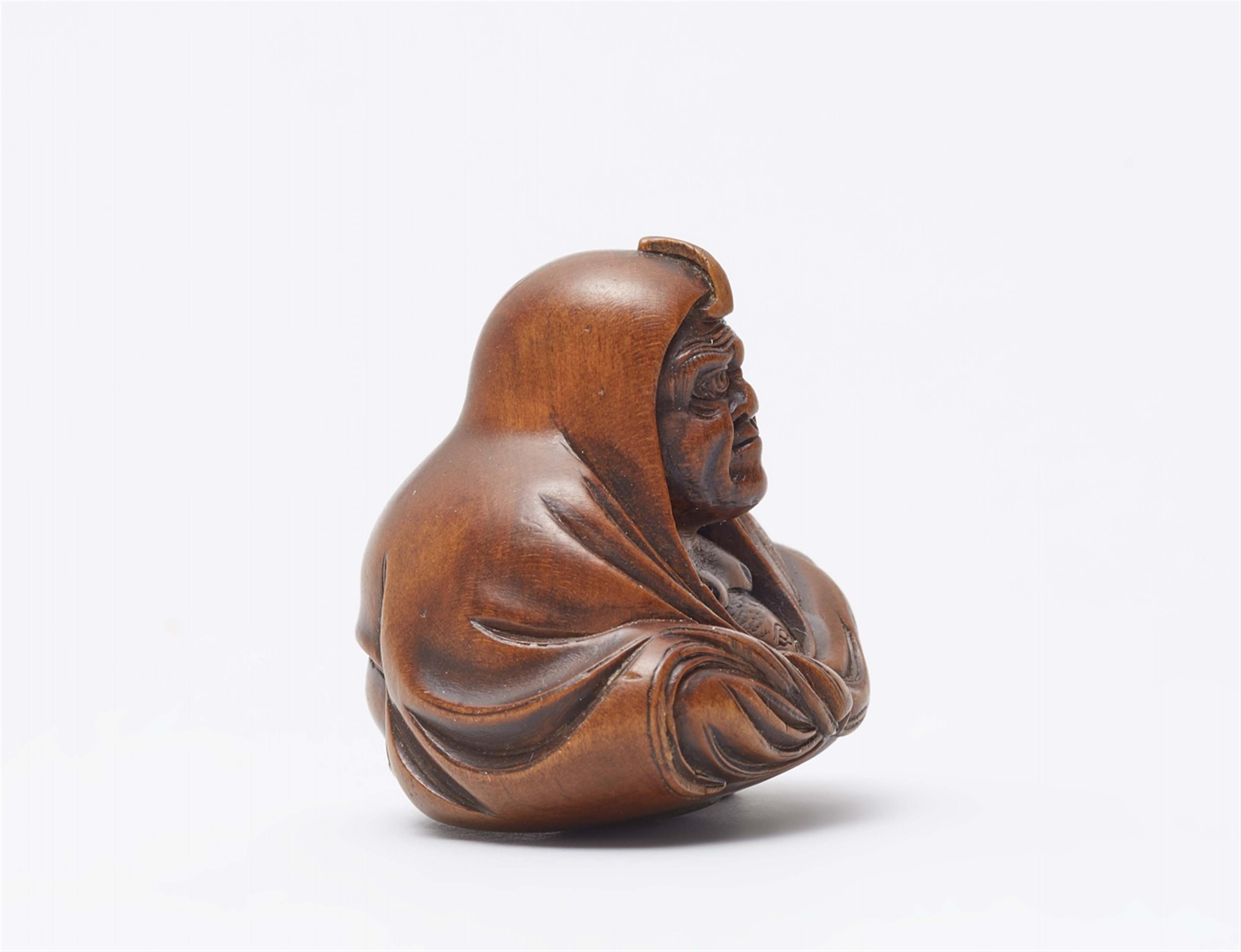 Daruma playing kamifuki. Boxwood. Mid-19th century - image-4