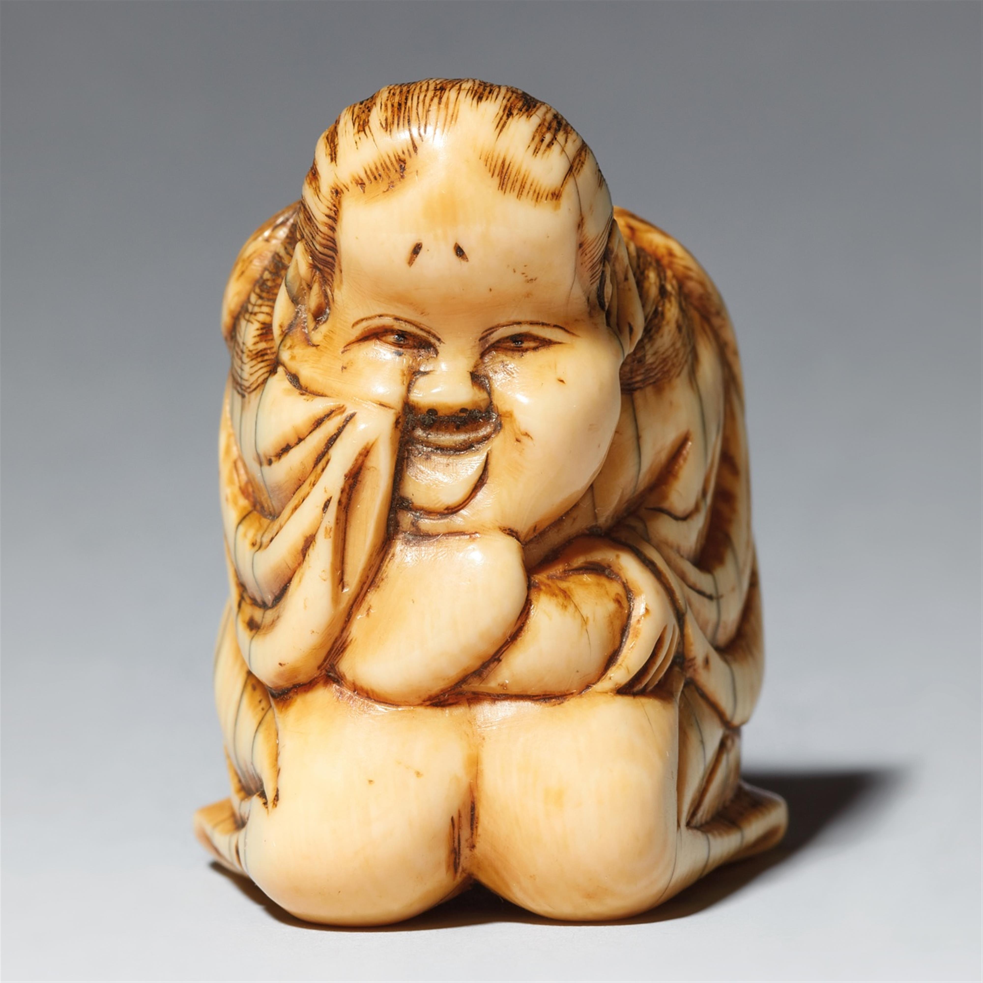 An ivory Shunga netsuke of an Okame. Early 19th century - image-1