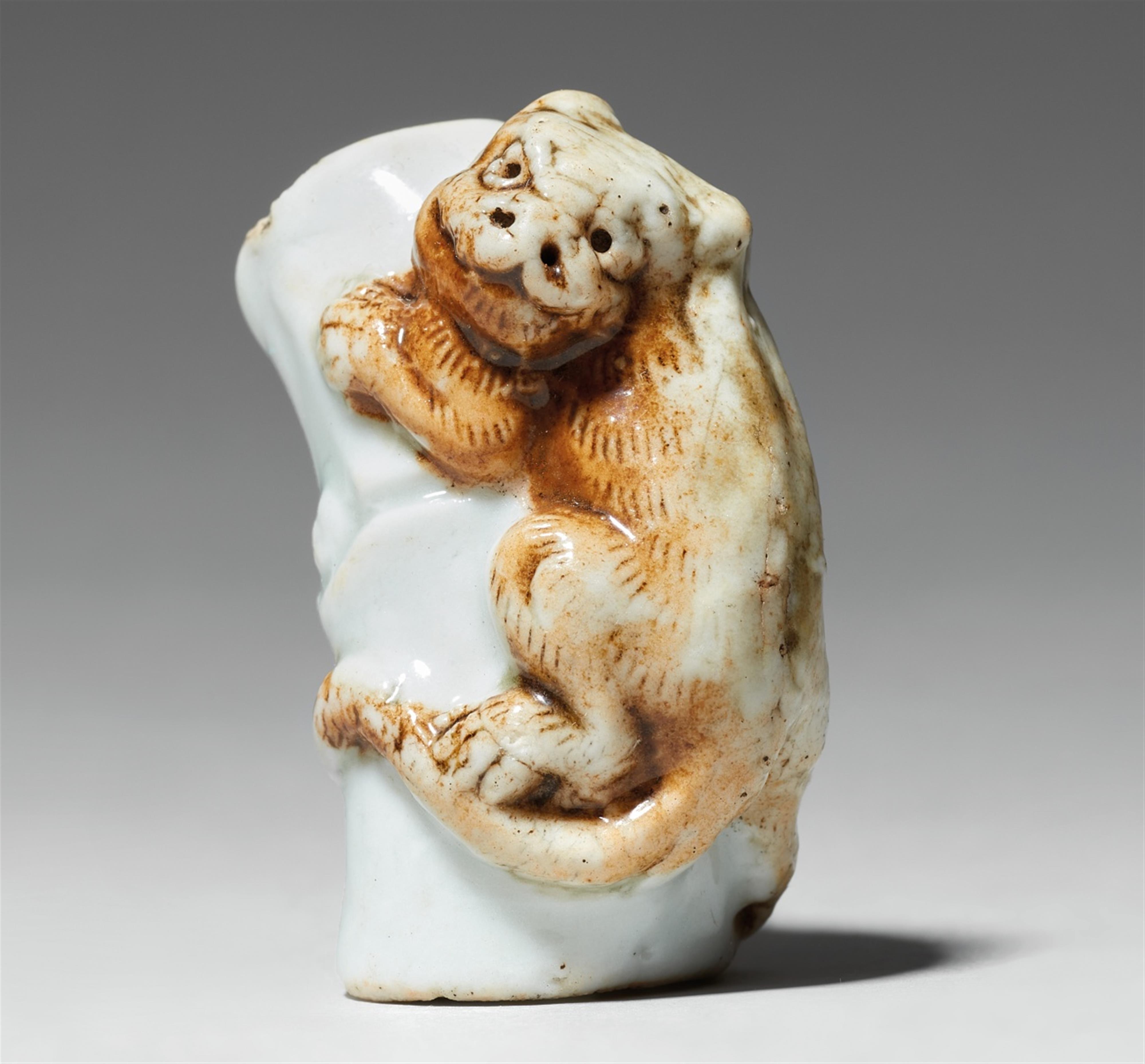 A porcelain netsuke of tiger on bamboo. 19th century - image-1