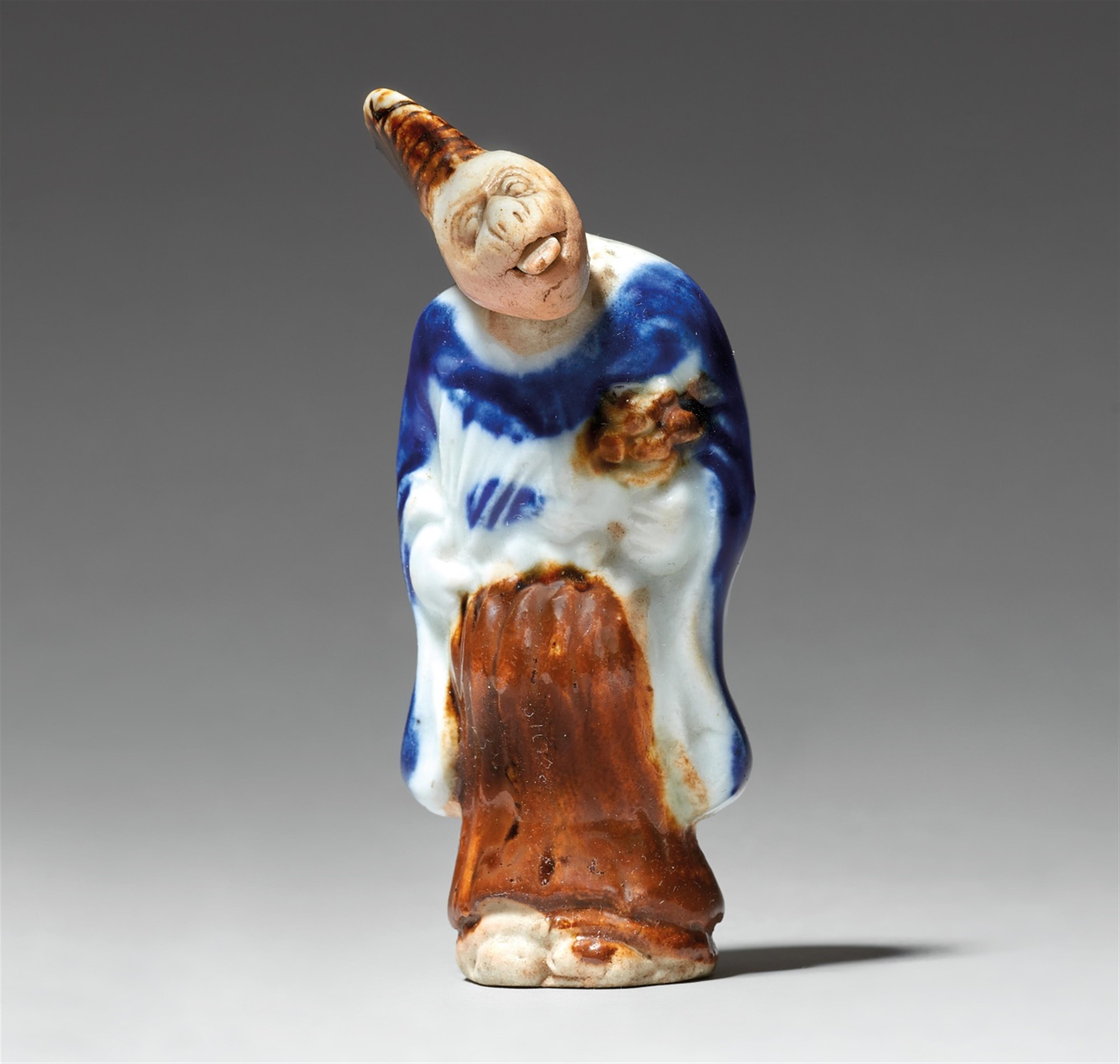 A Hirado porcelain netsuke of a monkey dressed as a manzai dancer. 19th century - image-1