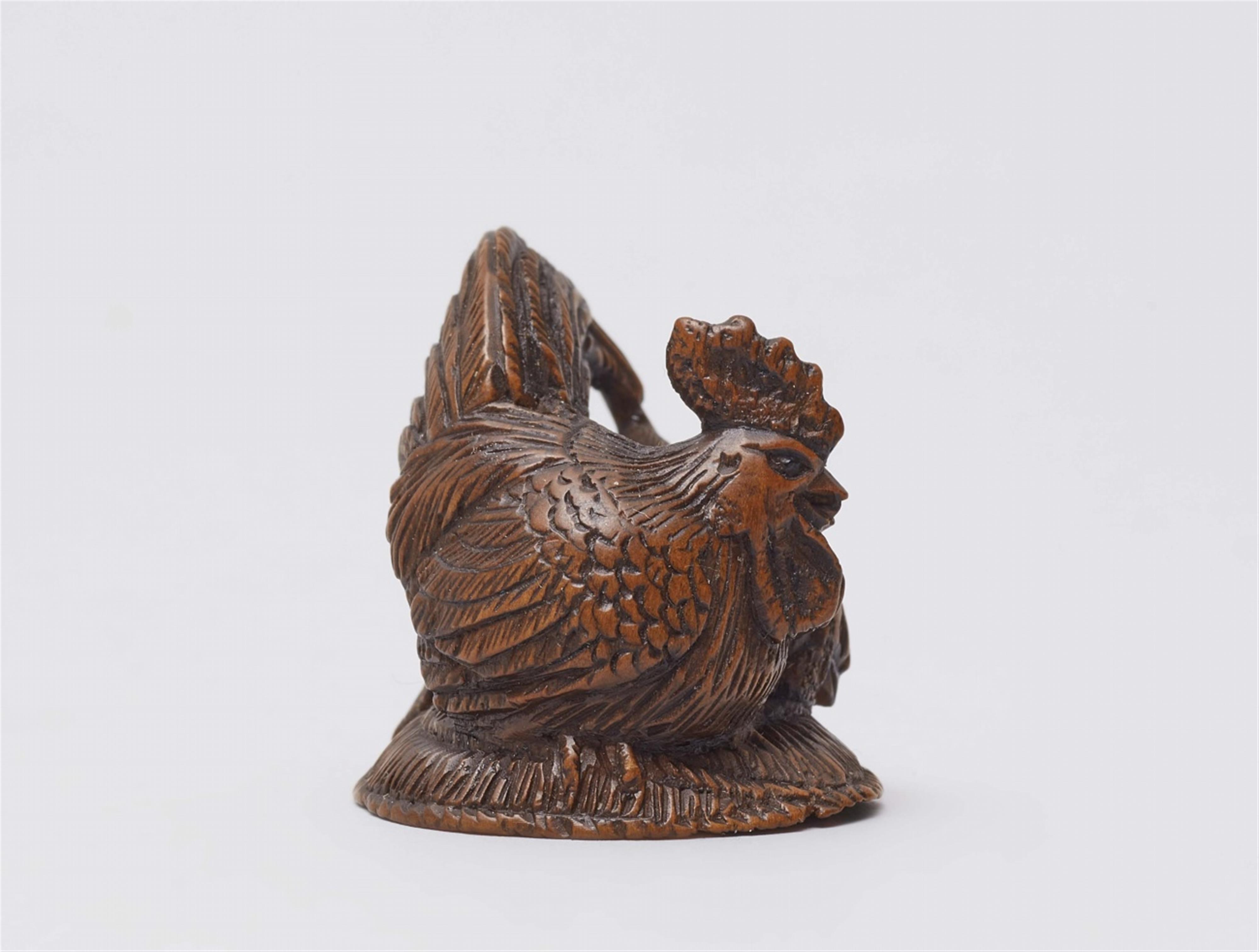 A boxwood netsuke of a cockerel and chicken. Mid-19th century - image-2