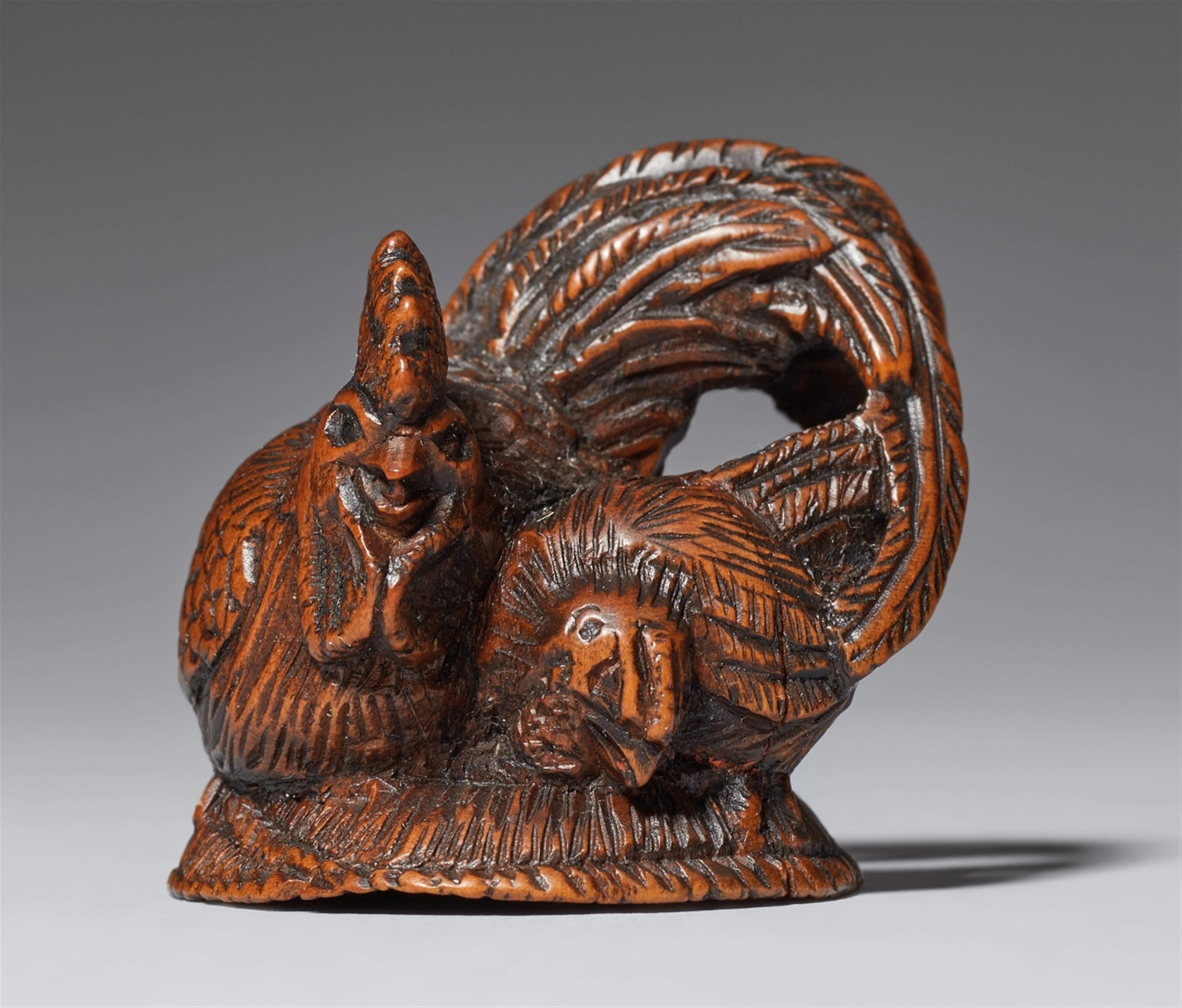 A boxwood netsuke of a cockerel and chicken. Mid-19th century - image-1