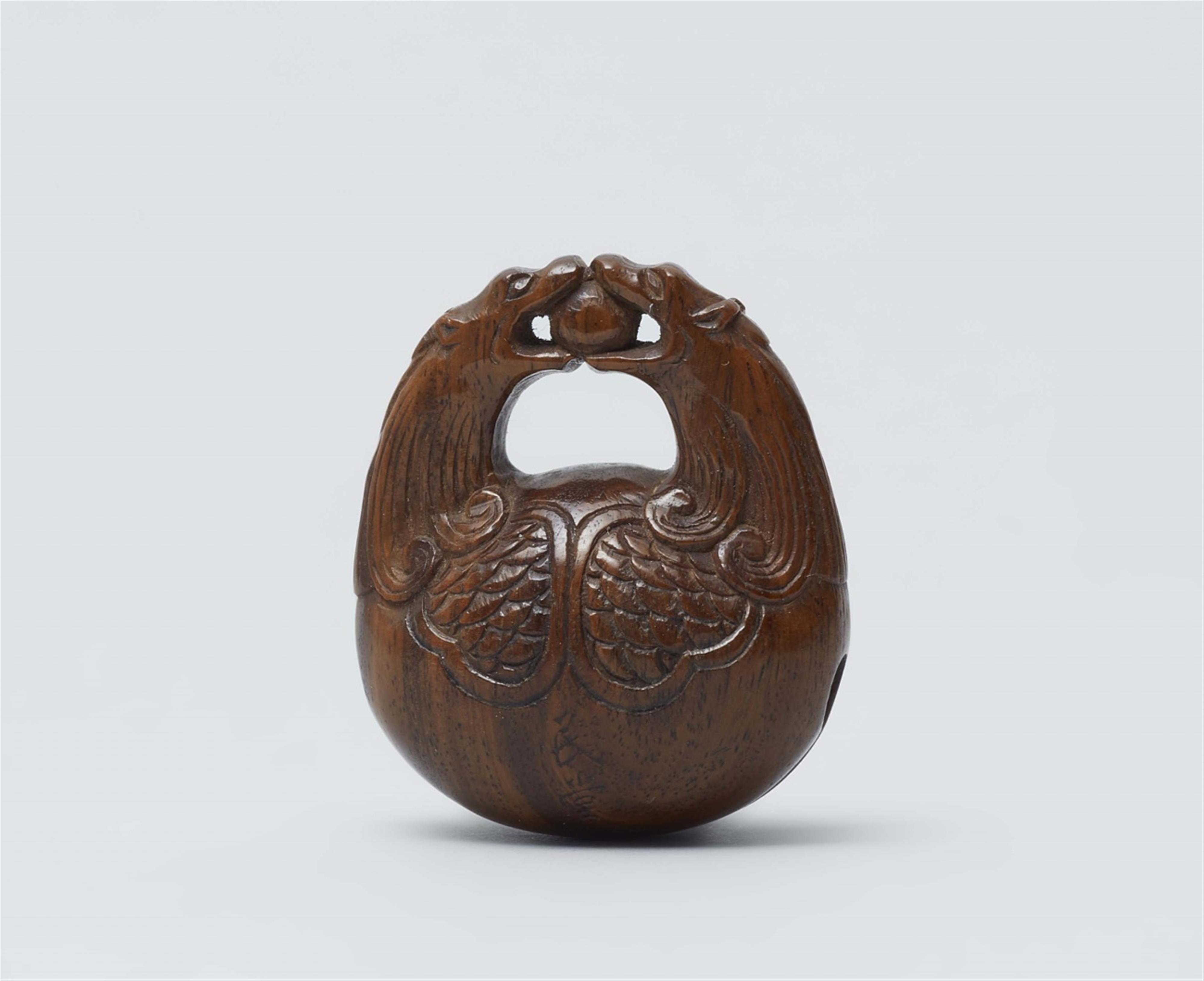 A wood netsuke of a mokugyo. Late 19th century - image-3