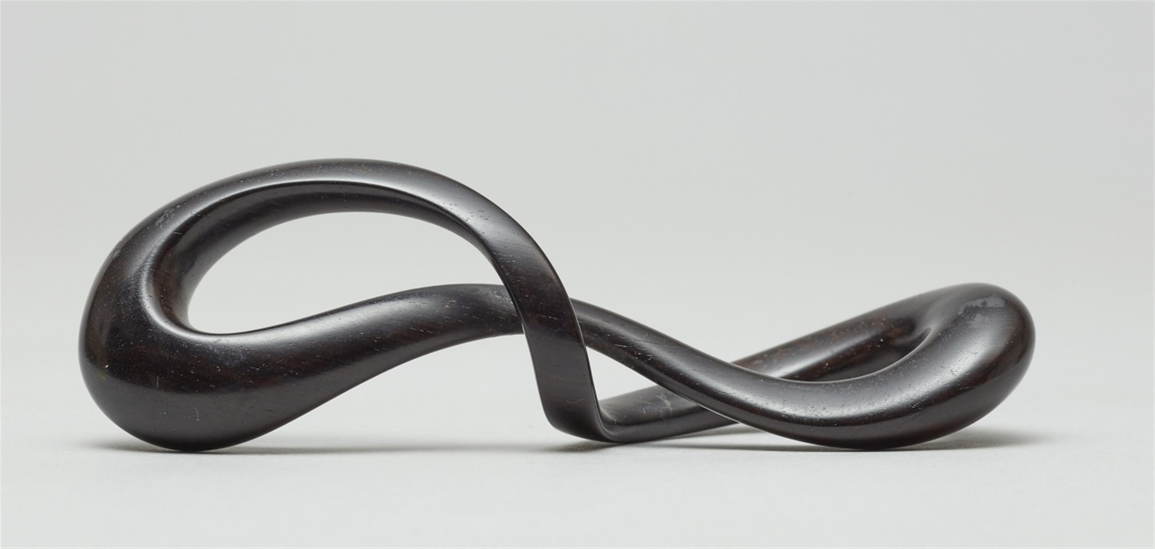 An ebony Moebius strip - image-2